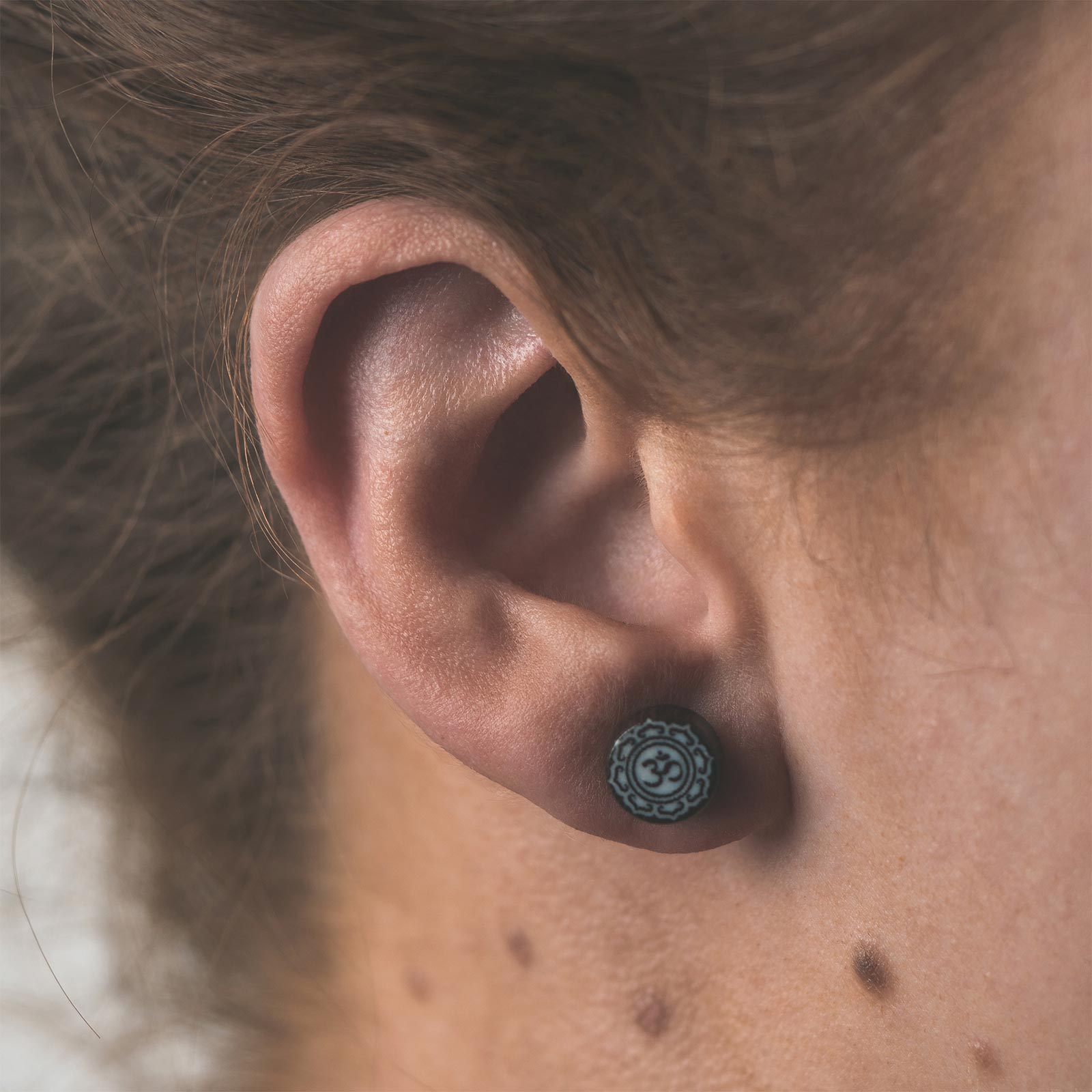 Palm Wood Fake Gauge Plug With Om Mani Bone Inlay Model Shot