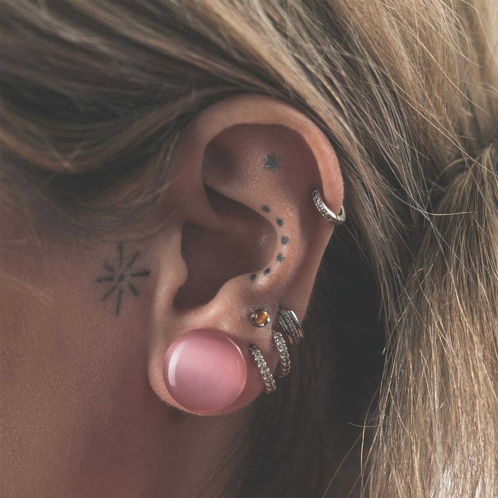 Pink Cat's Eye Glass Single Flare Convex Plug Model Shot