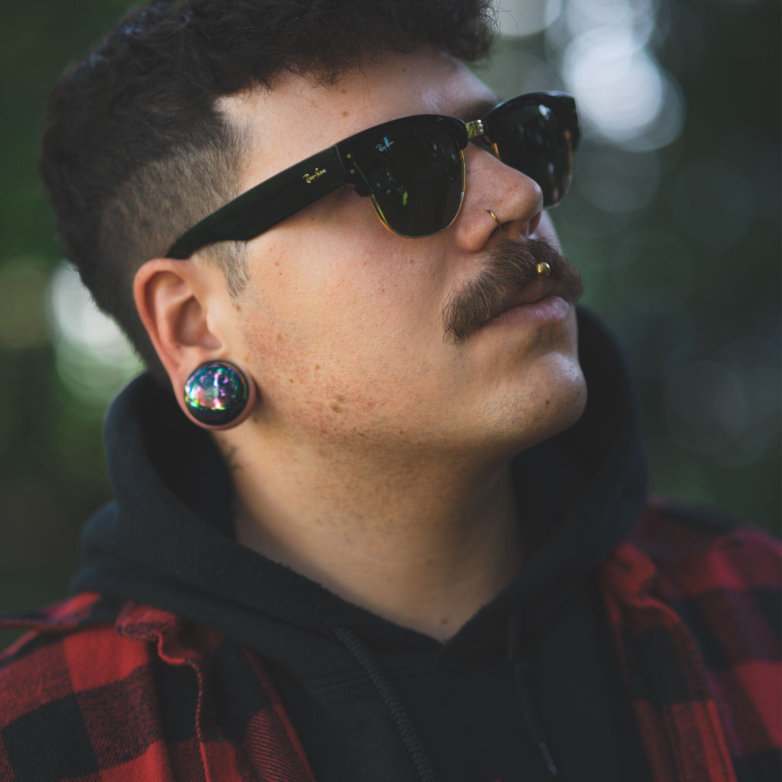 Rainbow Oil Slick Glass Double Flare Plug Model Shot Side Shot