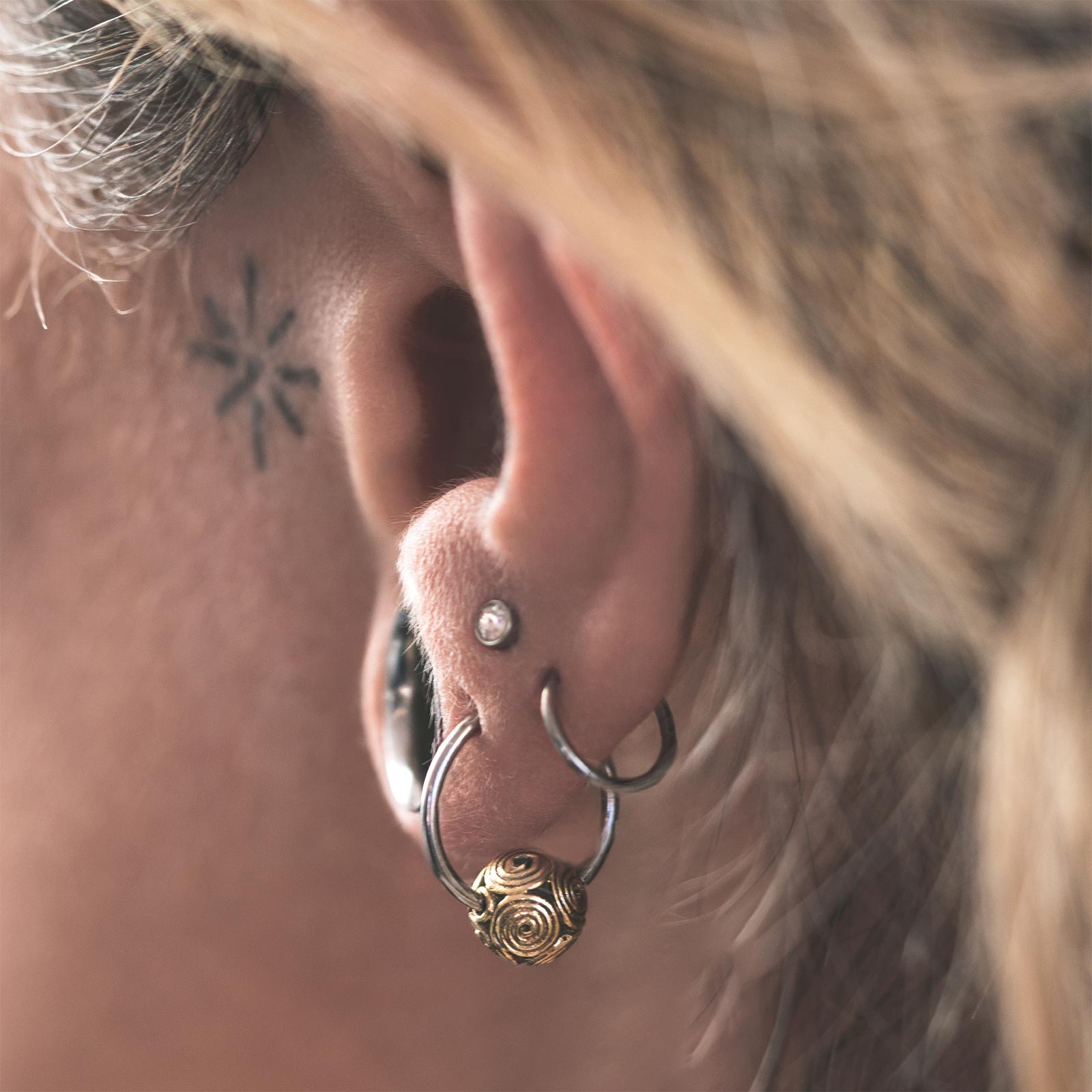 Repeating Circles Brass & Surgical Steel BCR Ball Closure Ring Model Shot