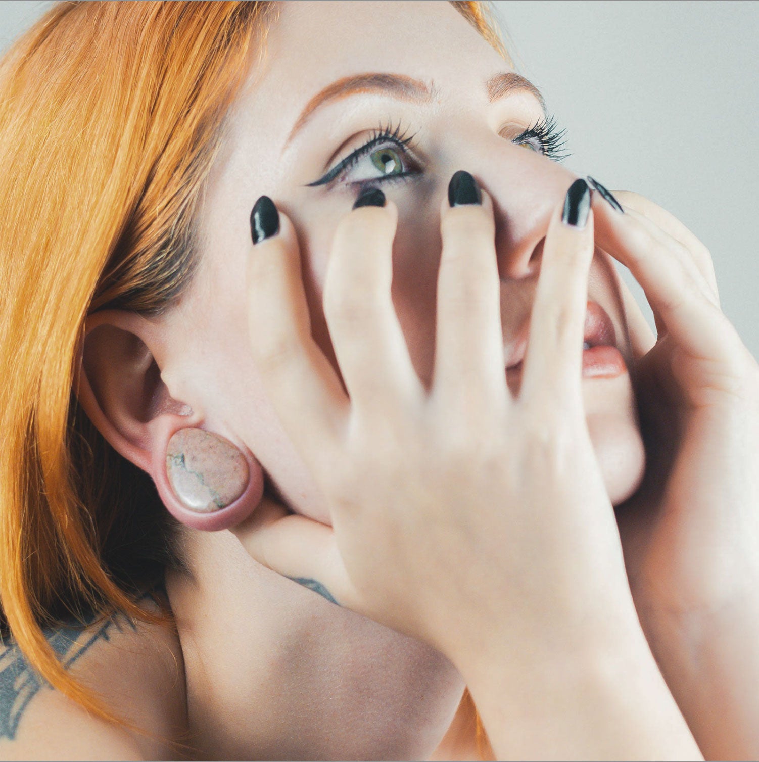 Rhodonite Double Flare Convex Teardrop Plug Model ShotRhodonite Double Flare Convex Teardrop Plug Model Shot