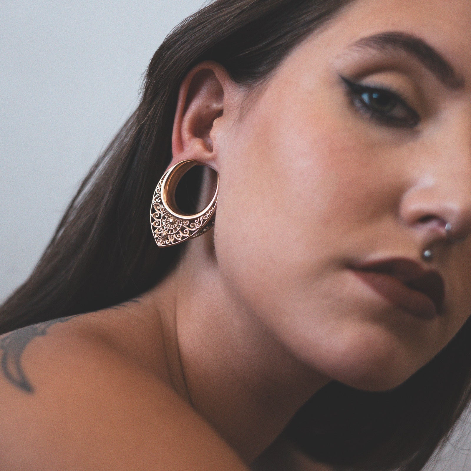 Rose Gold PVD Regal Shield Saddle Ear Weight Model Shot