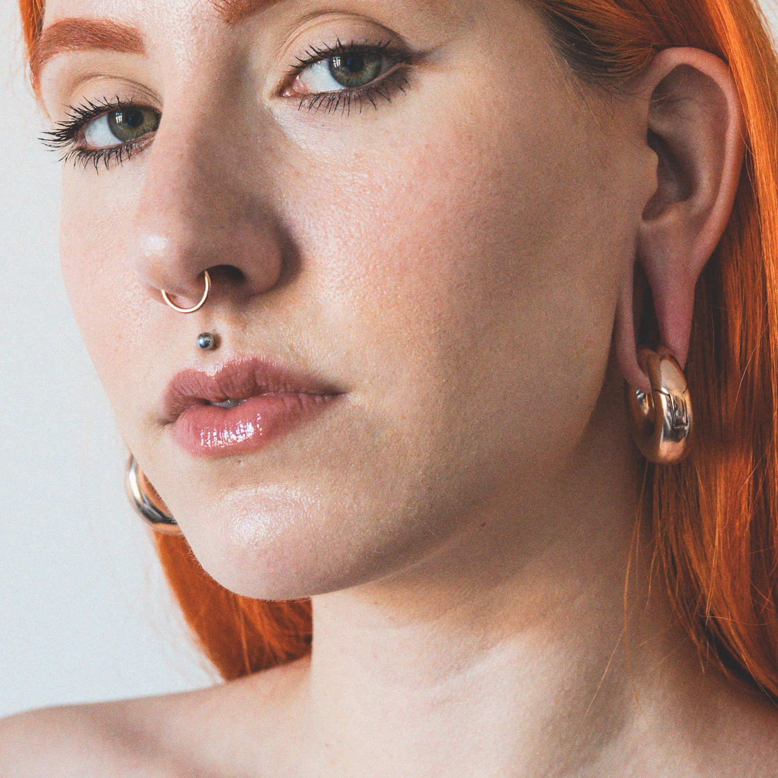 Rose Gold PVD Titanium Hinged Segment Ring Model Shot