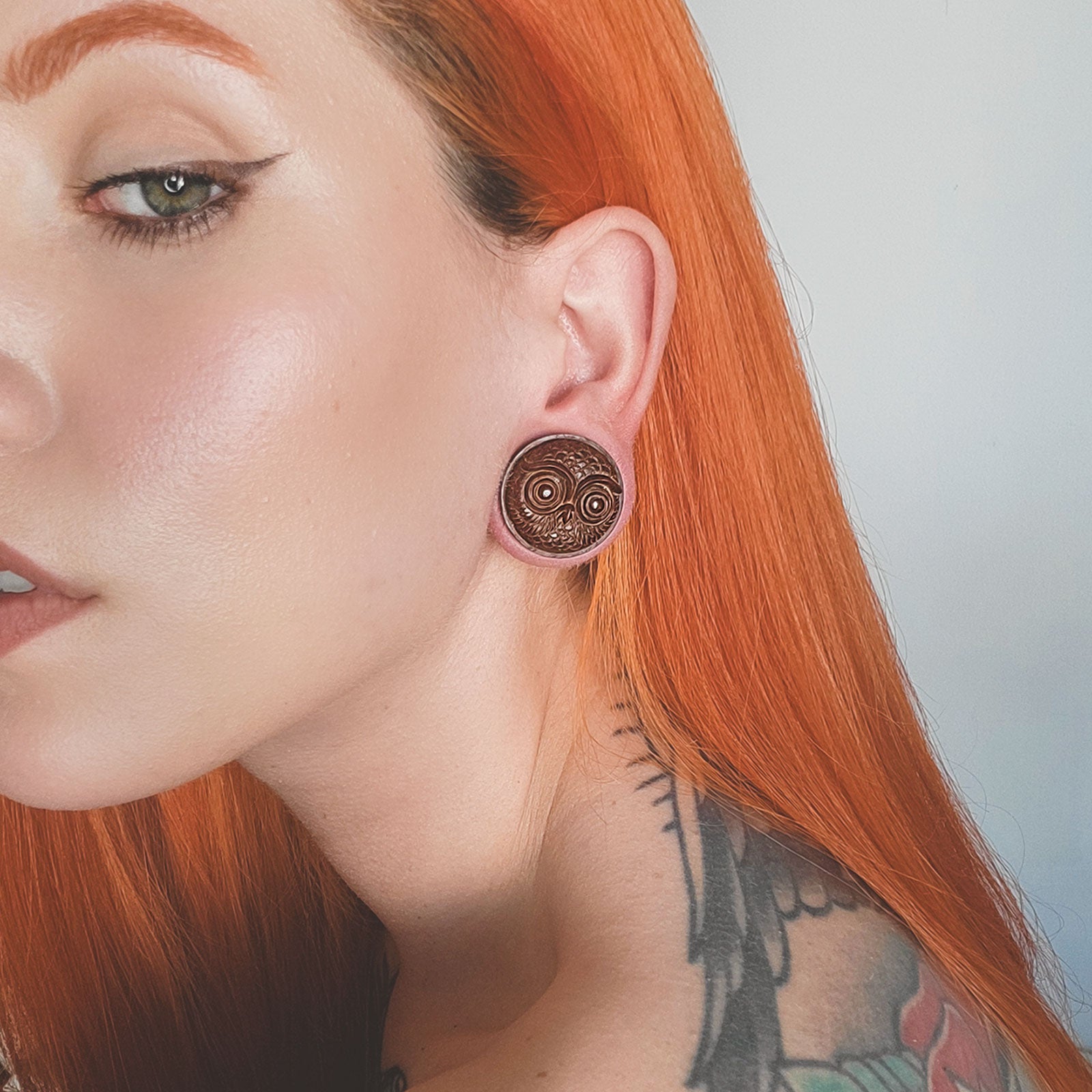 Saba Wood Double Flare Plug With Owl Carving Model Shot