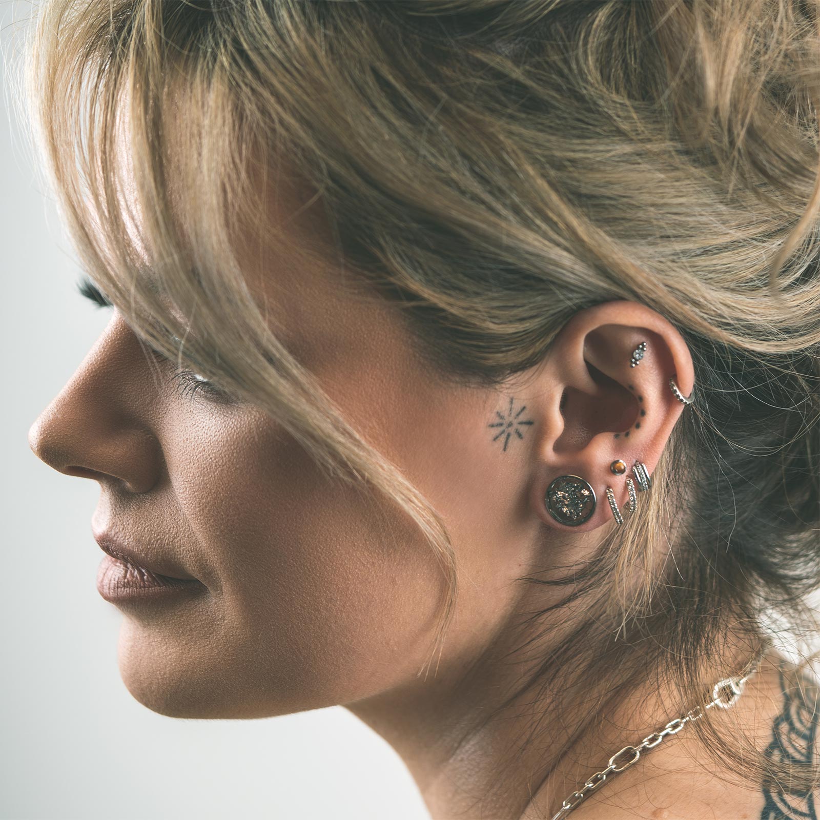 Silver Flake Double Flare Surgical Steel Plug Model Shot