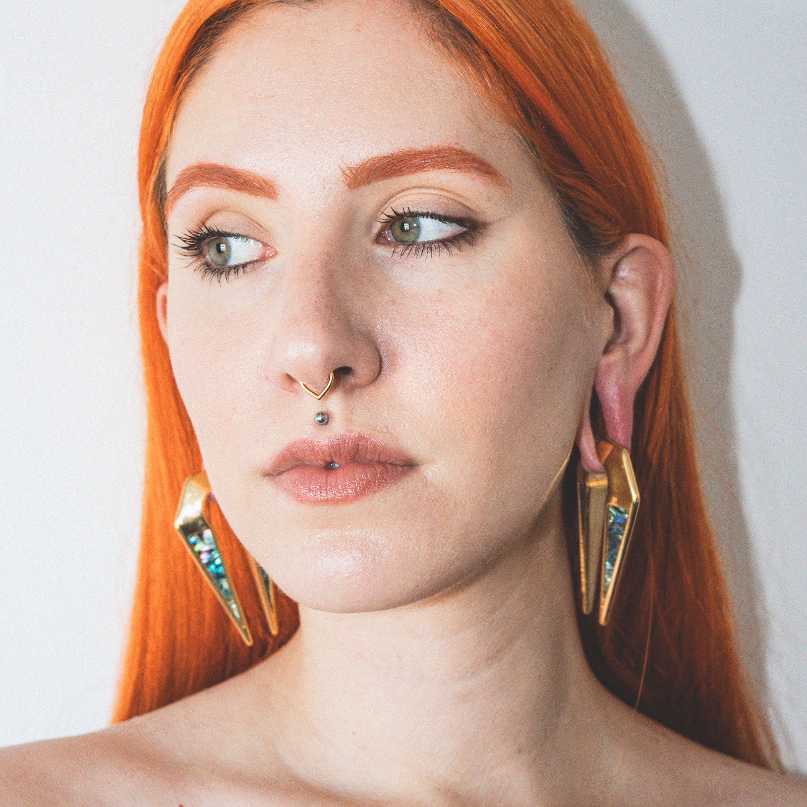 Simple Teardrop Gold PVD Titanium Septum Clicker Ring Model Shot Side Shot