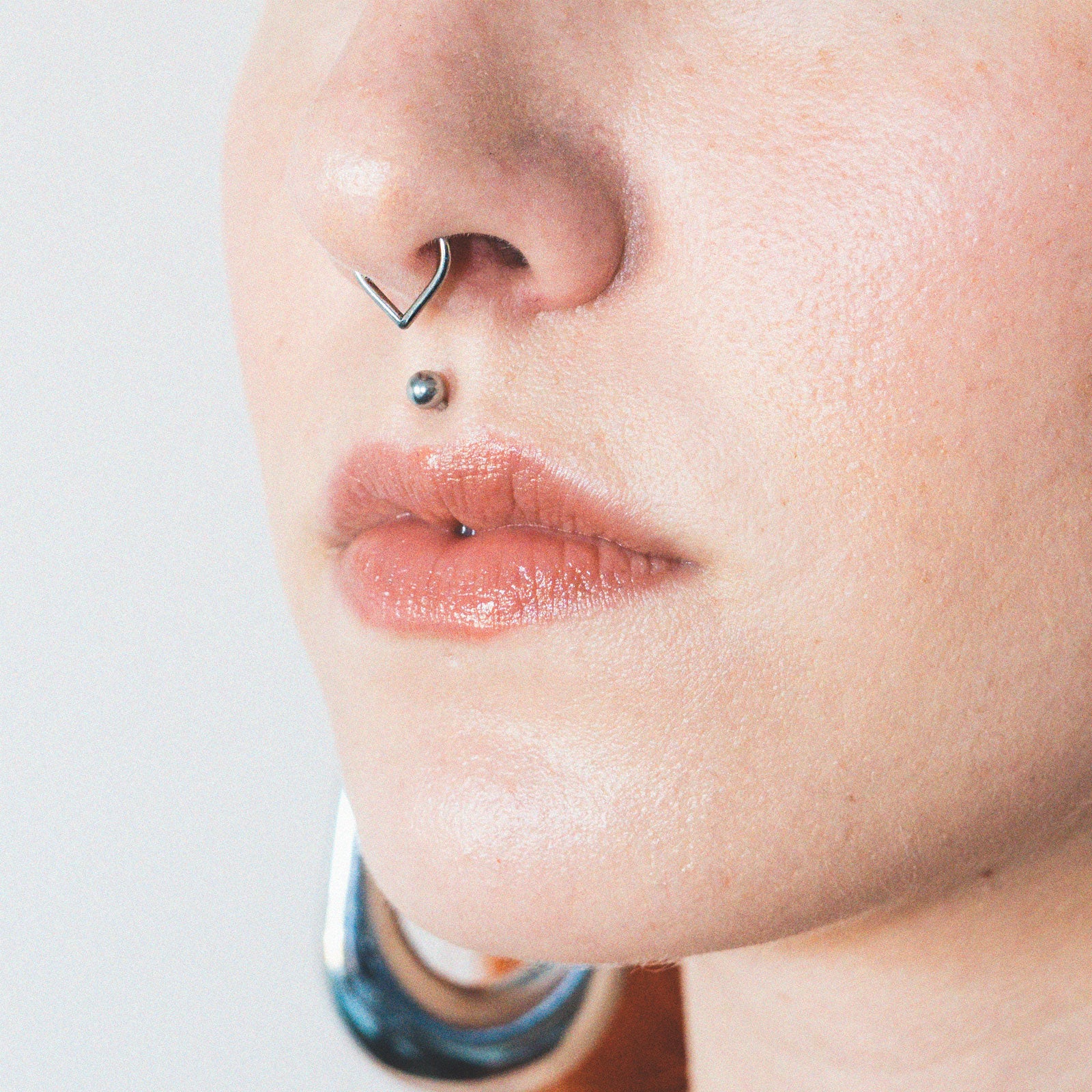Simple Teardrop Titanium Septum Clicker Ring Model Shot Two