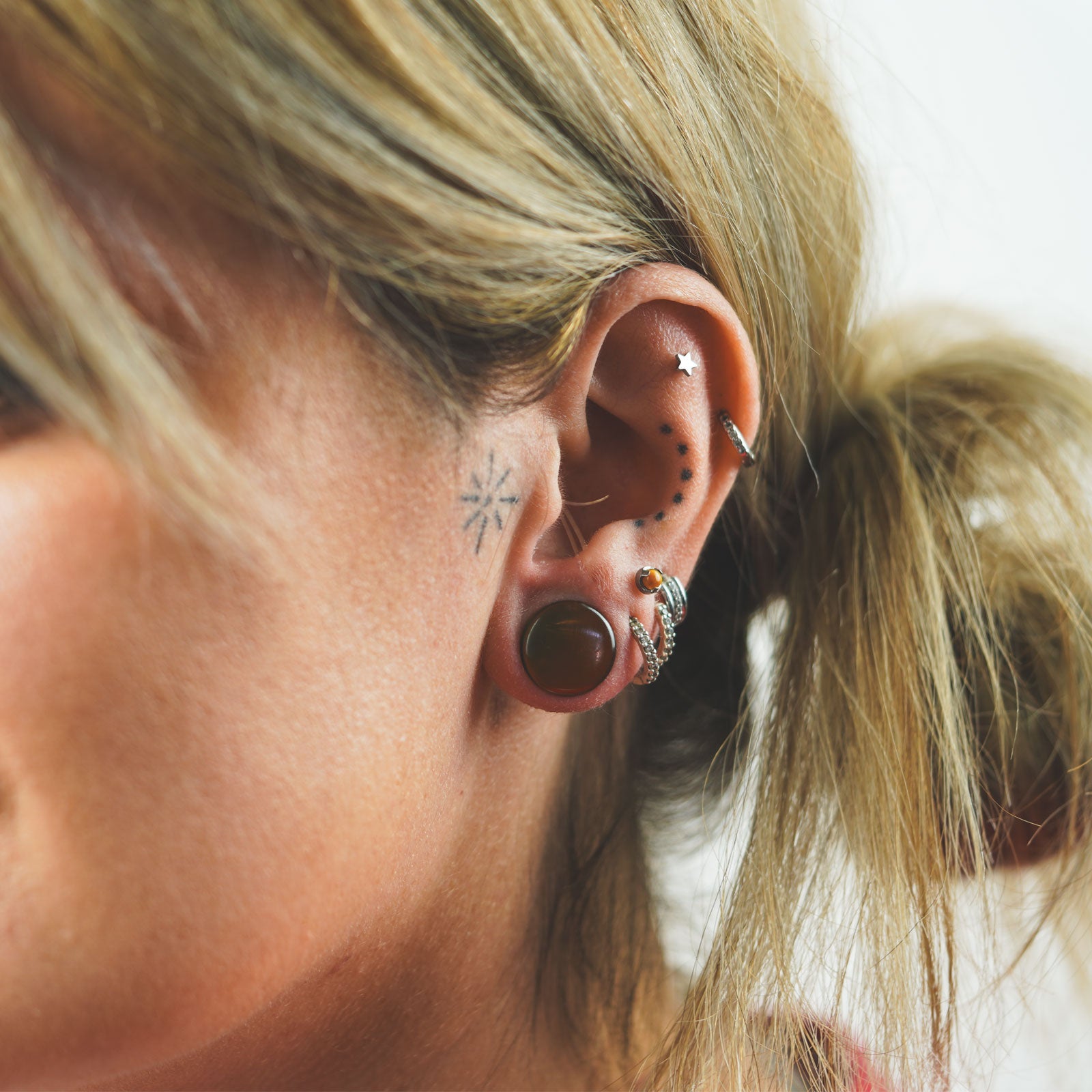 Smokey Topaz Glass Double Flare Convex Plug Model Shot Two