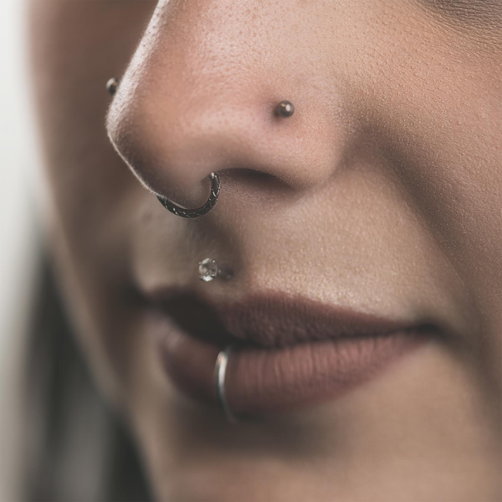 Snake Skin Titanium Septum Clicker Ring Model Shot Side Shot