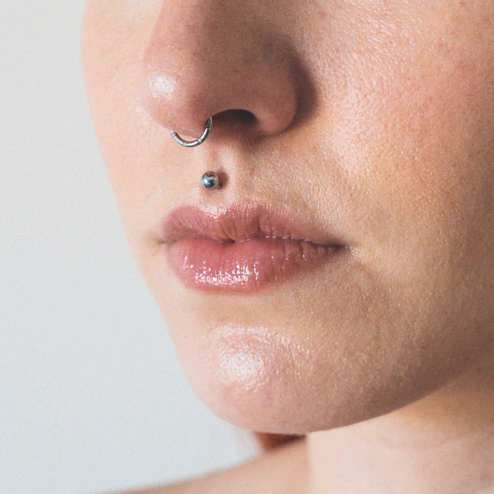 Spaced Jewelled Titanium Hinged Segment Ring Model Shot