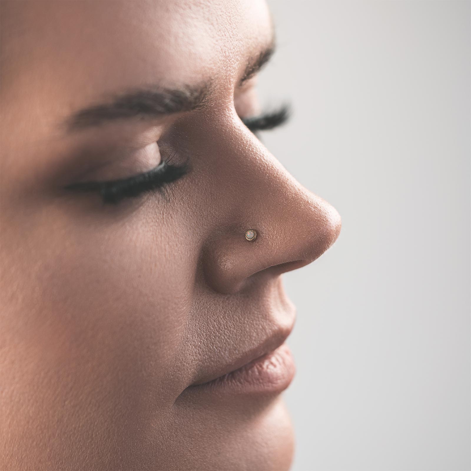 Synthetic White Opal Brass Nose Stud (Nose Bone) Model Shot