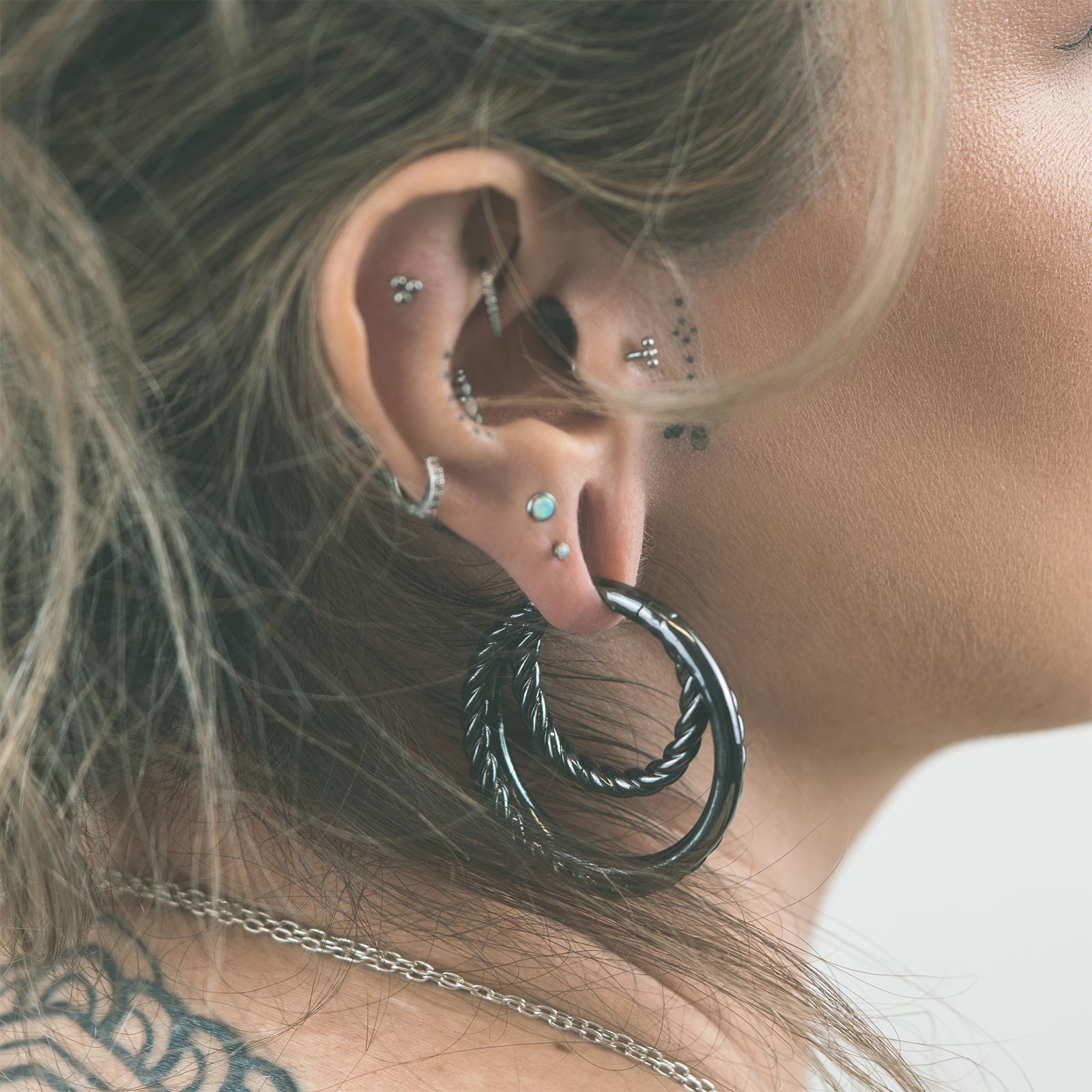 Twisted Rope Multi Hoop Black PVD Ear Weight Model Shot