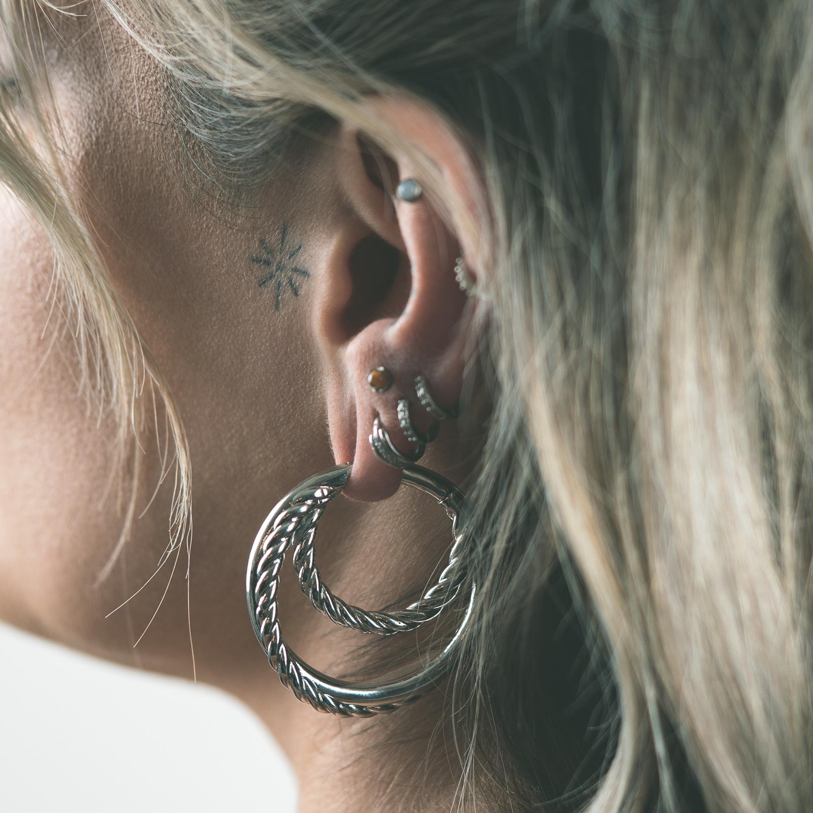 Twisted Rope Multi Hoop Surgical Steel Ear Weight Model Shot