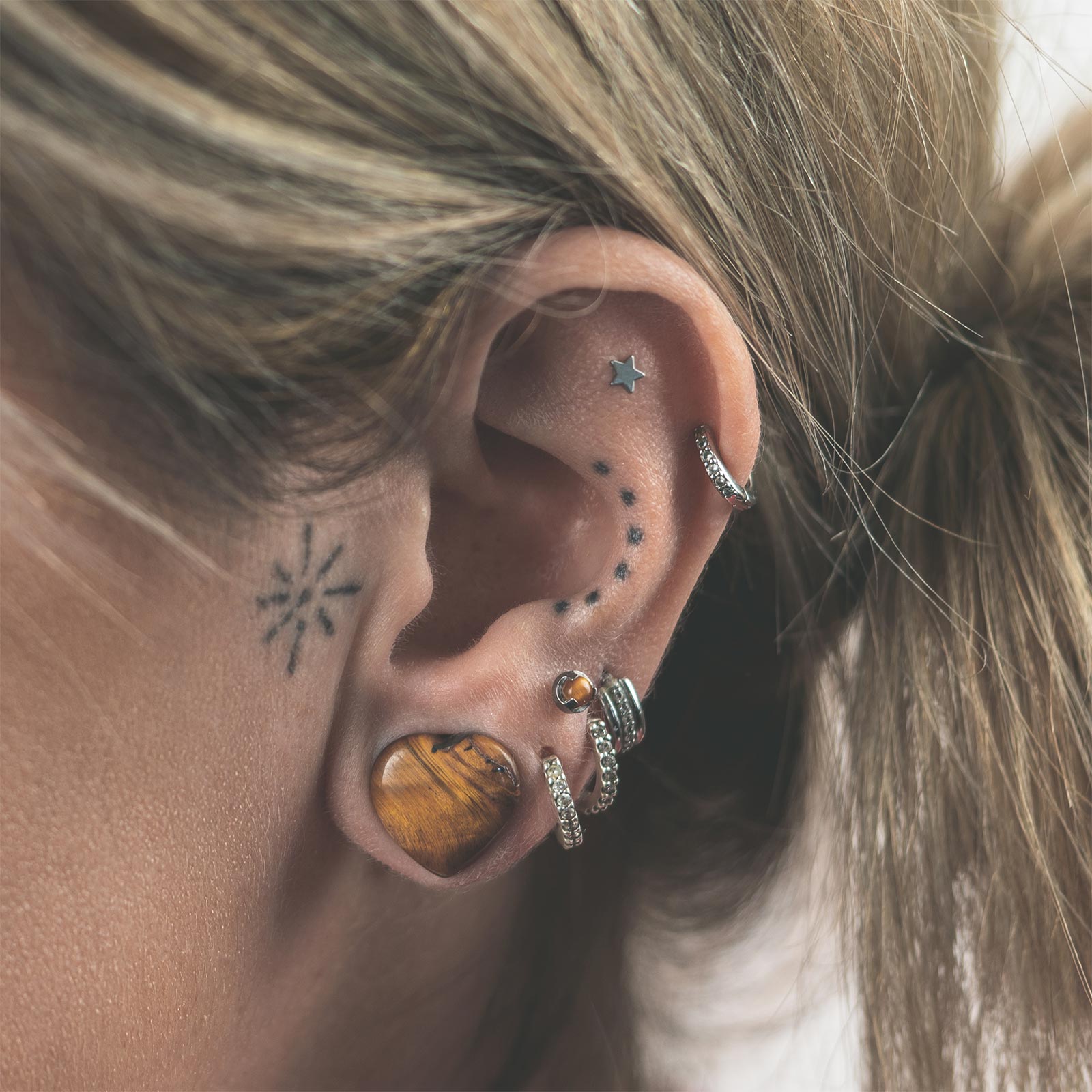 Yellow Tiger's Eye Heart Shaped Double Flare Stone Plug Model Shot