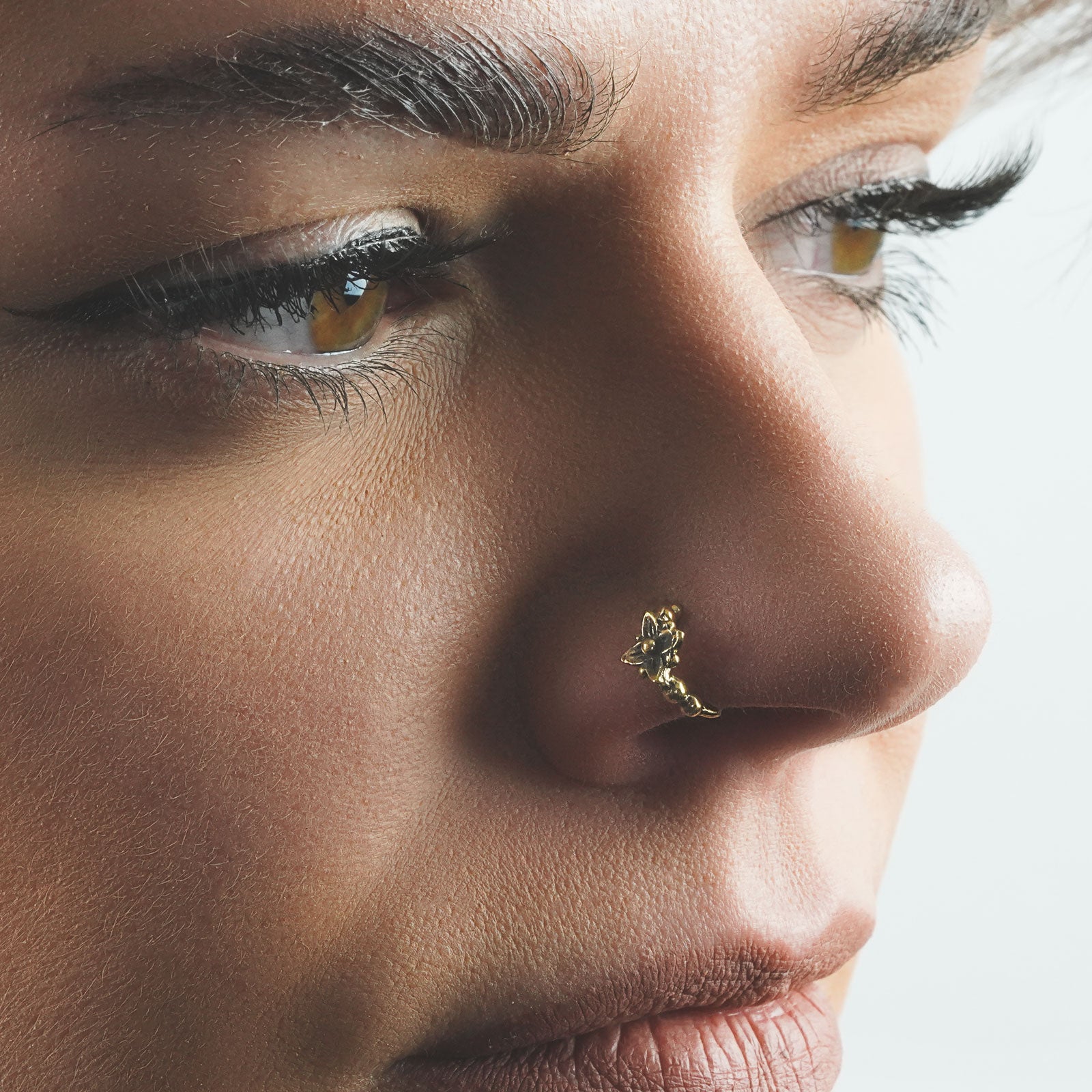 Beaded Lily Brass Seamless Septum Nose Ring Model Shot