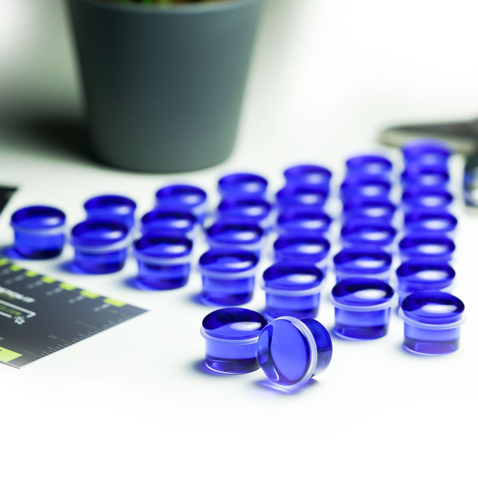 Blue Glass Single Flare Convex Plug Group Shot