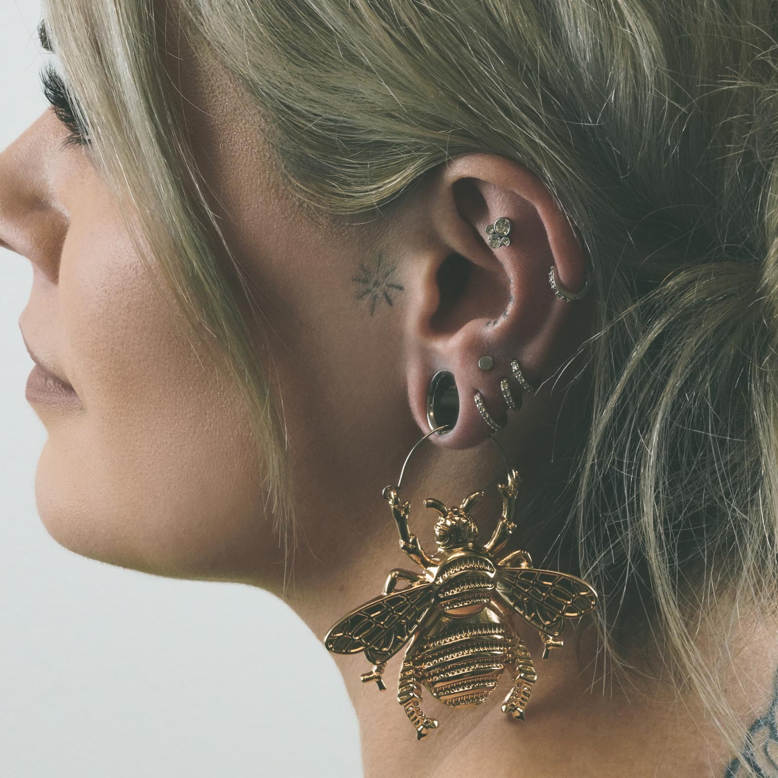 Bumble Bee Gold PVD Plug Hoops Model Shot