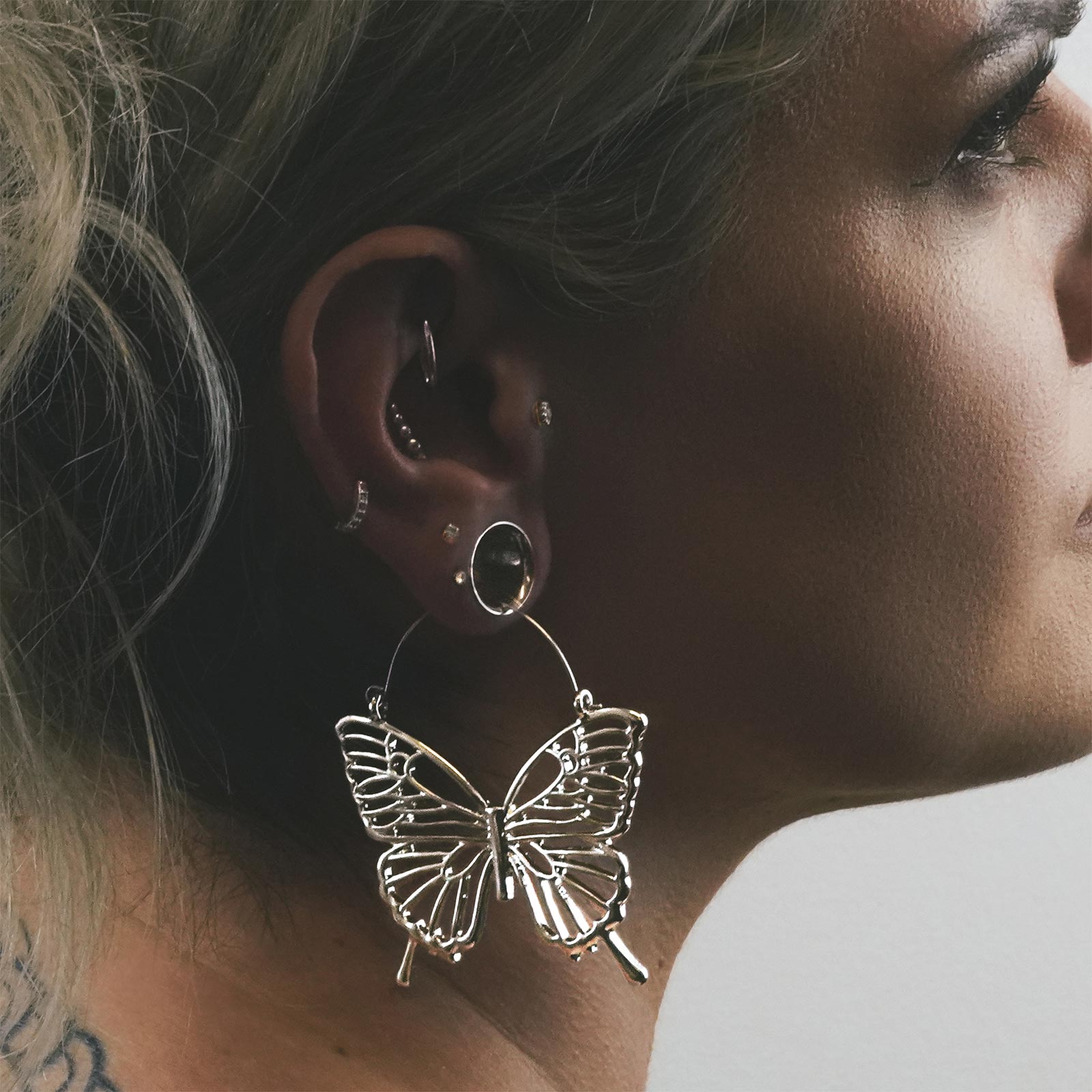 Butterfly Silver Plug Hoops Model Shot