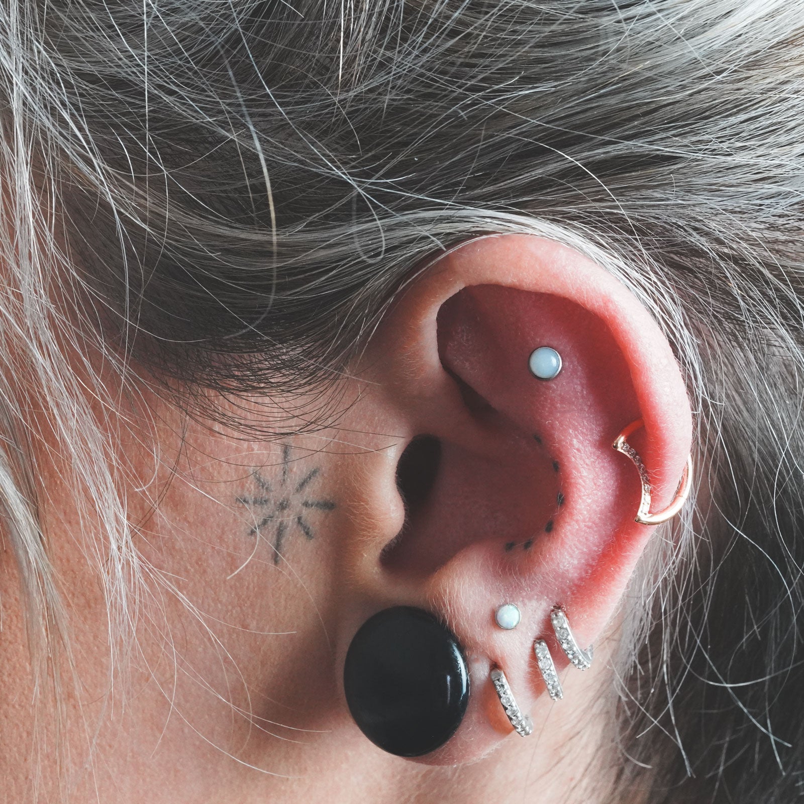 Crescent Bejewelled Rose Gold PVD Titanium Hinged Segment Daith Earring Model Shot