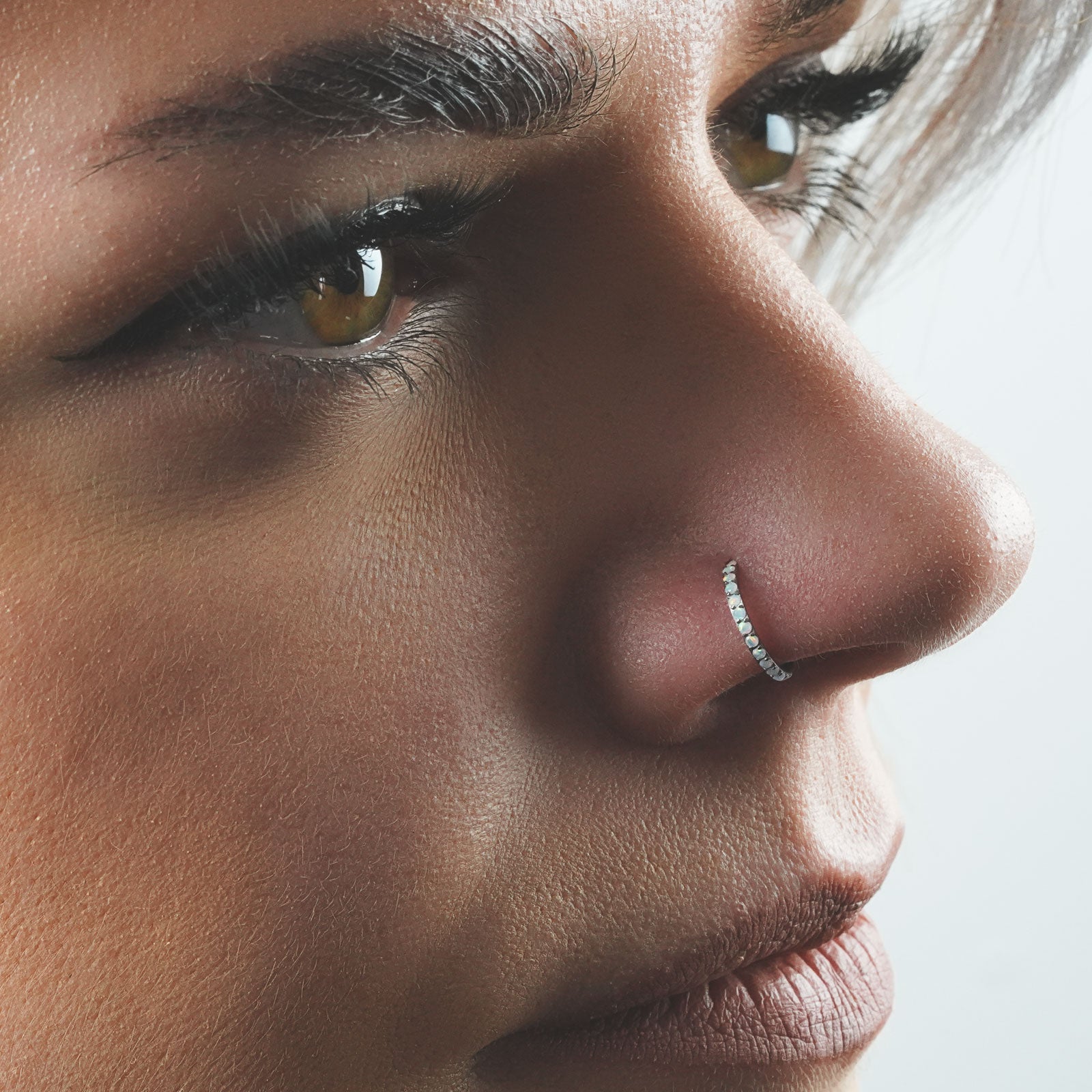 Edged Fire Snow Synth Opal Titanium Hinged Segment Ring Model Shot