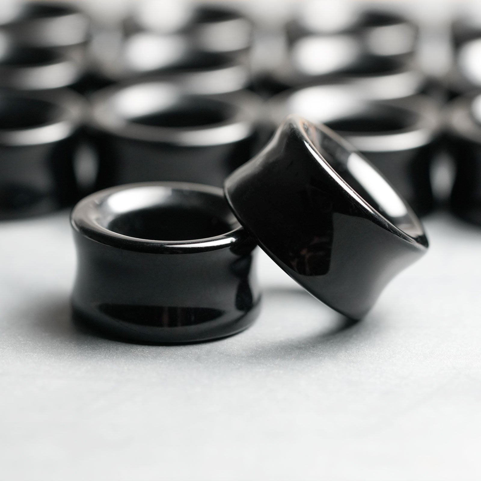 Jet Black Glass Double Flare Concave Tunnel Groupshot