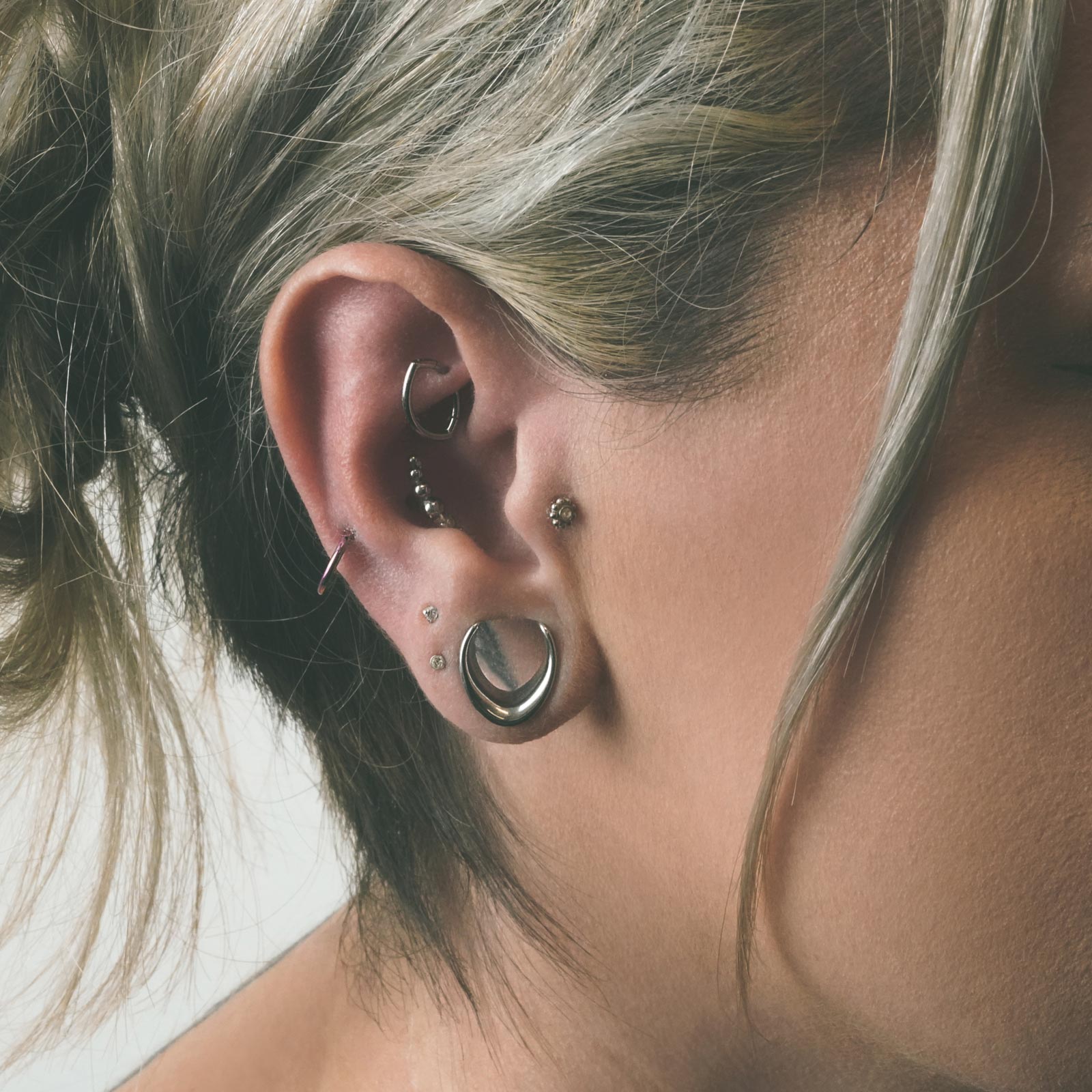 Oval Titanium Hinged Segment Daith Earring Model Shot