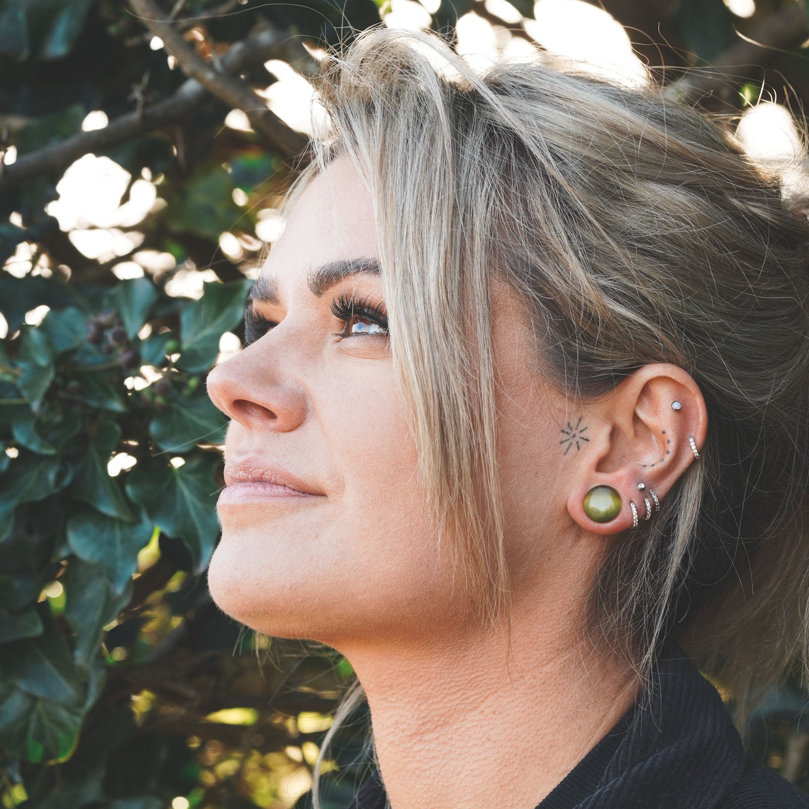 peridot single flare cats eye plug model shot side shot