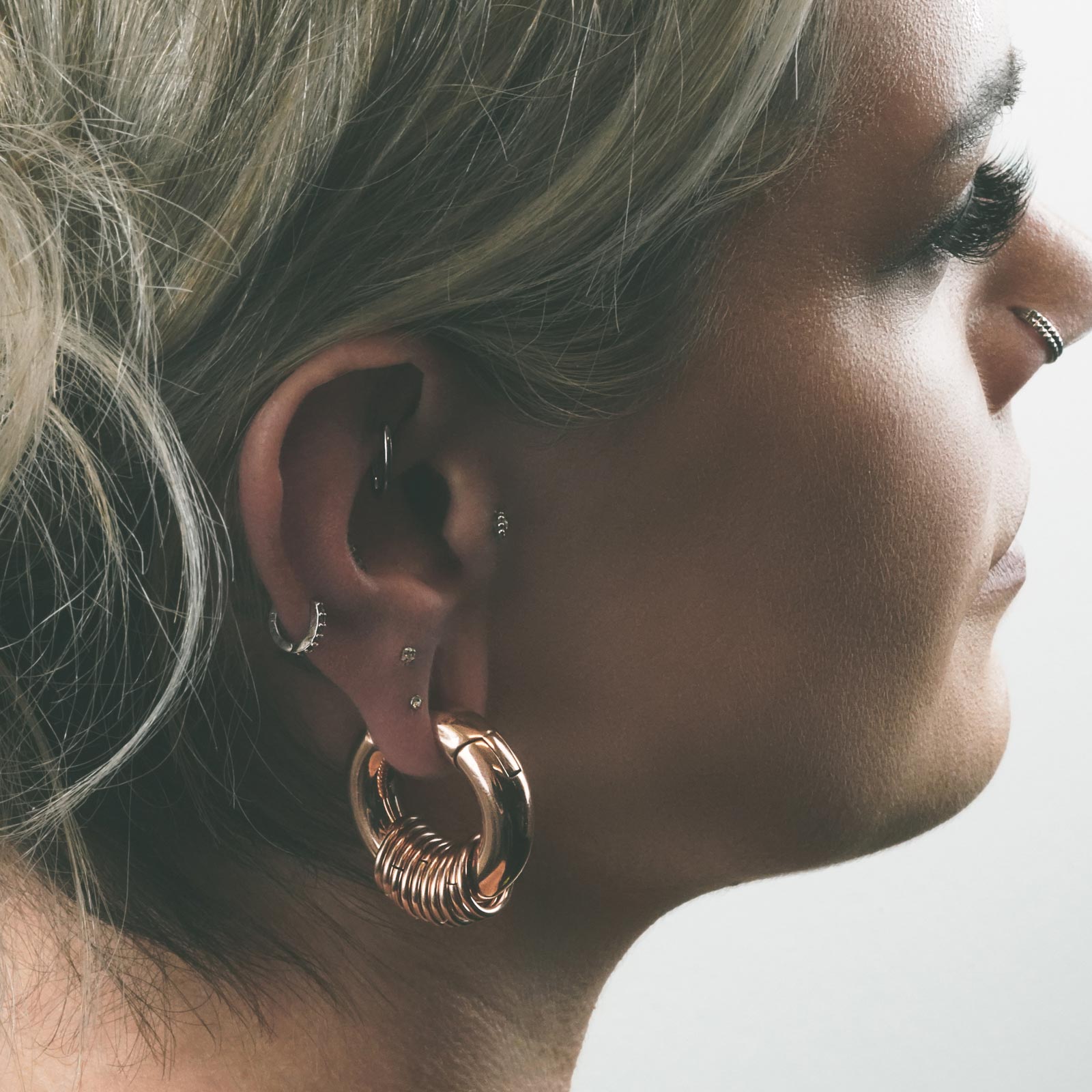 Rose Gold PVD Magnetic Multi Hoop Ear Weight Model Shot