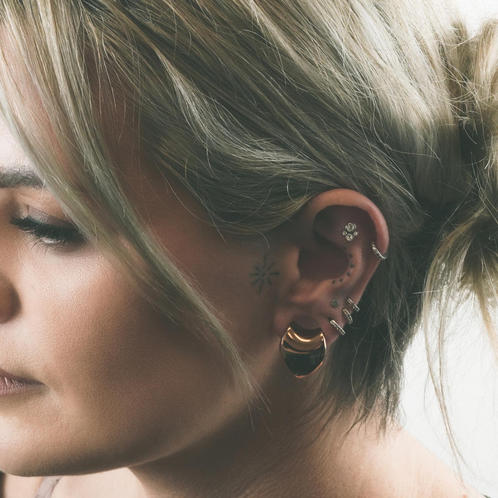 Rose Gold PVD Saddle Ear Weight Hanger Model Shot