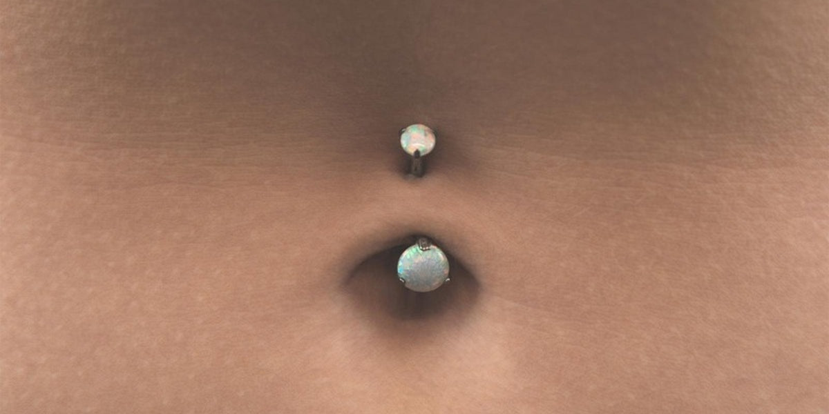 Gold belly bars - opal belly bar in a navel piercing