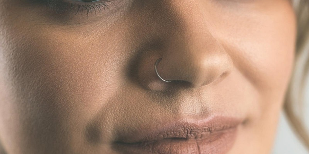 Silver nose rings - seamless nose ring in a nostril piercing