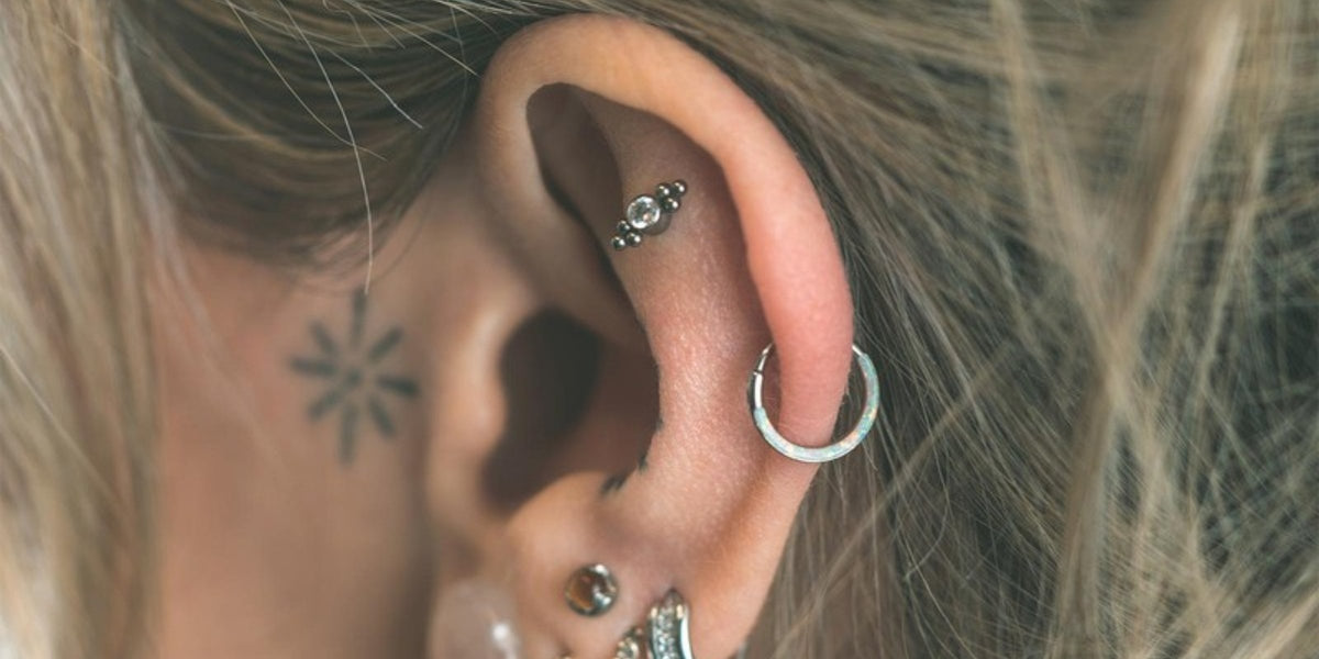 Flat piercing jewellery - opal titanium stud on the upper ear