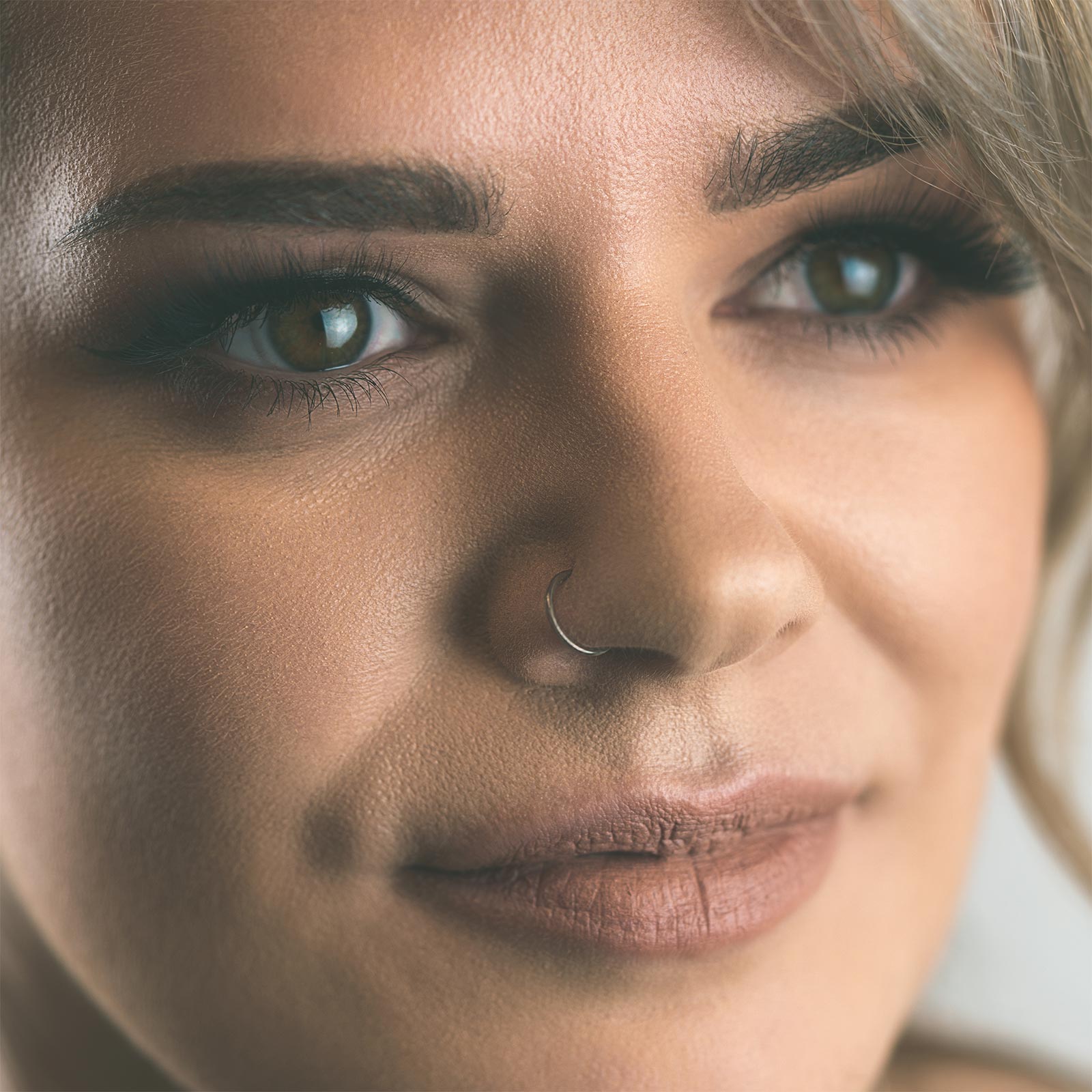 model wearing nose ring