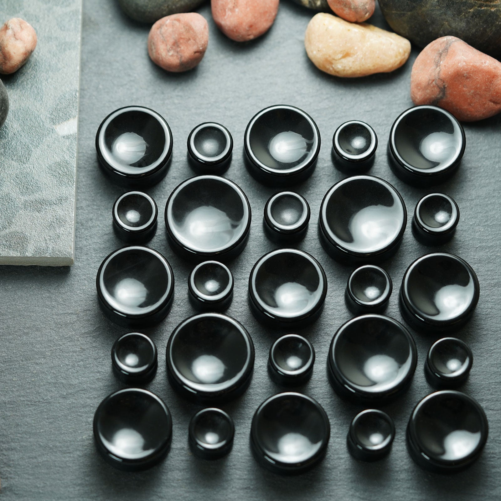 Black Onyx Double Flare Concave Stone Plug Group Shot