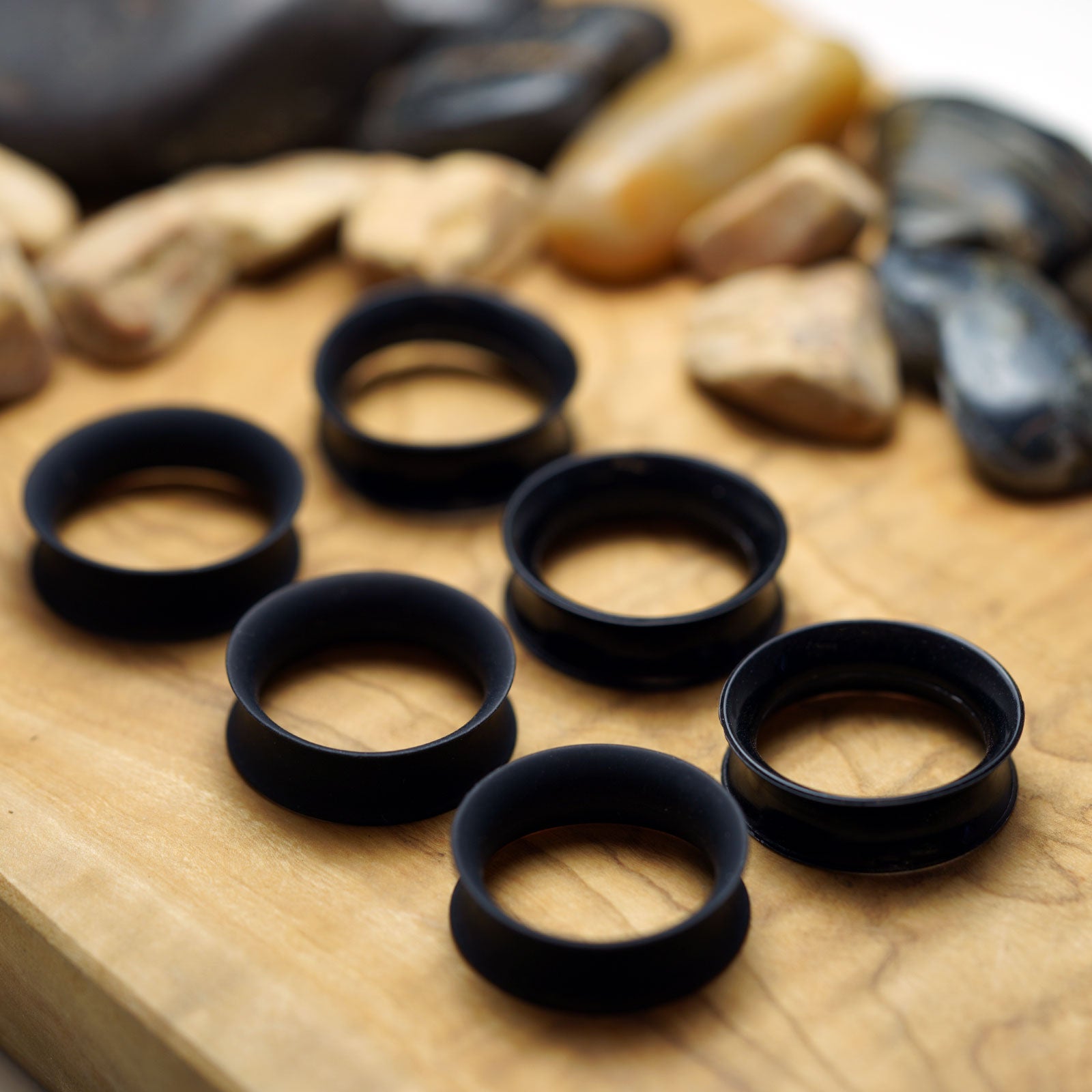 Black Silicone Double Flare Saddle Tunnel Group Shot