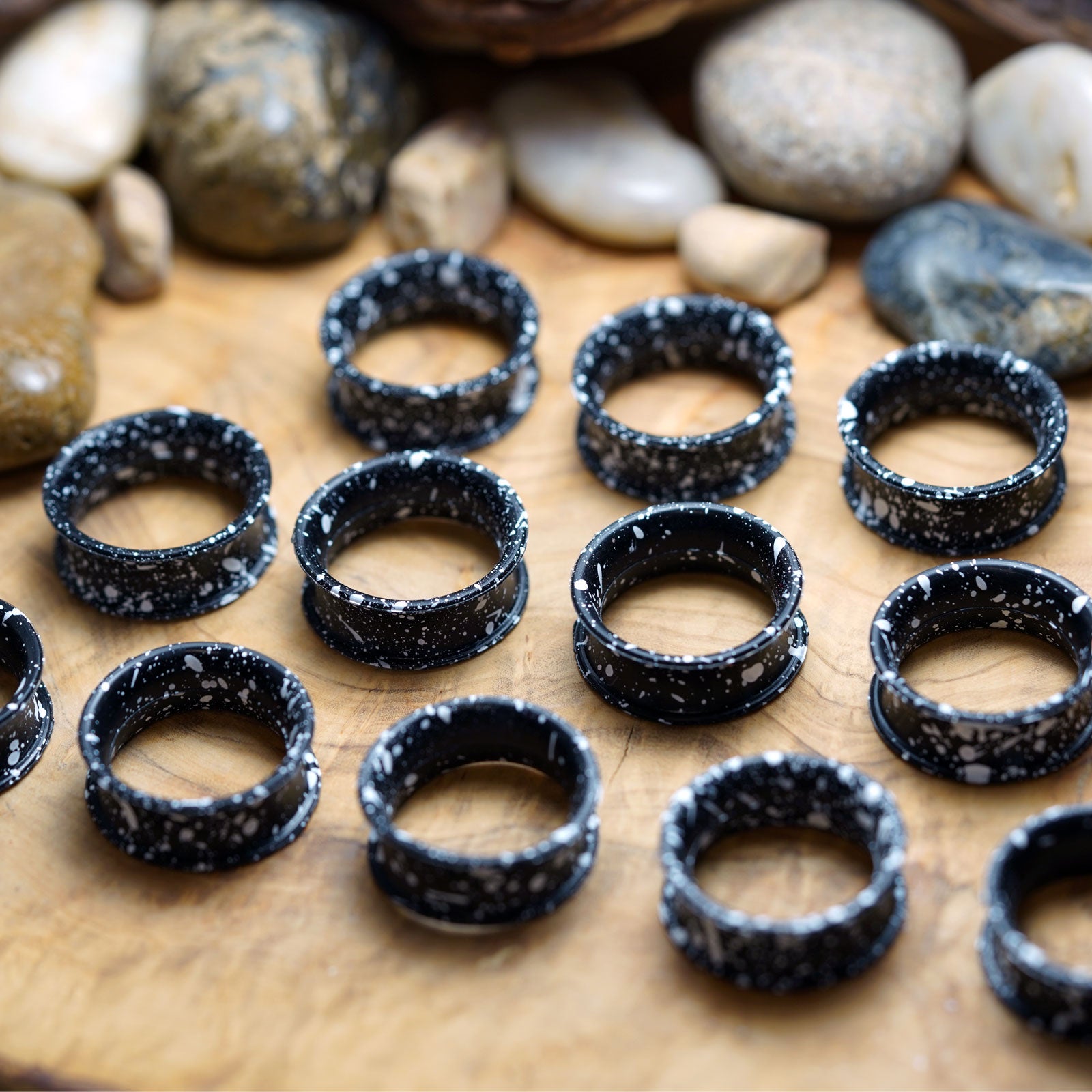 Black With White Paint Splat Double Flare Silicone Tunnel Group Shot