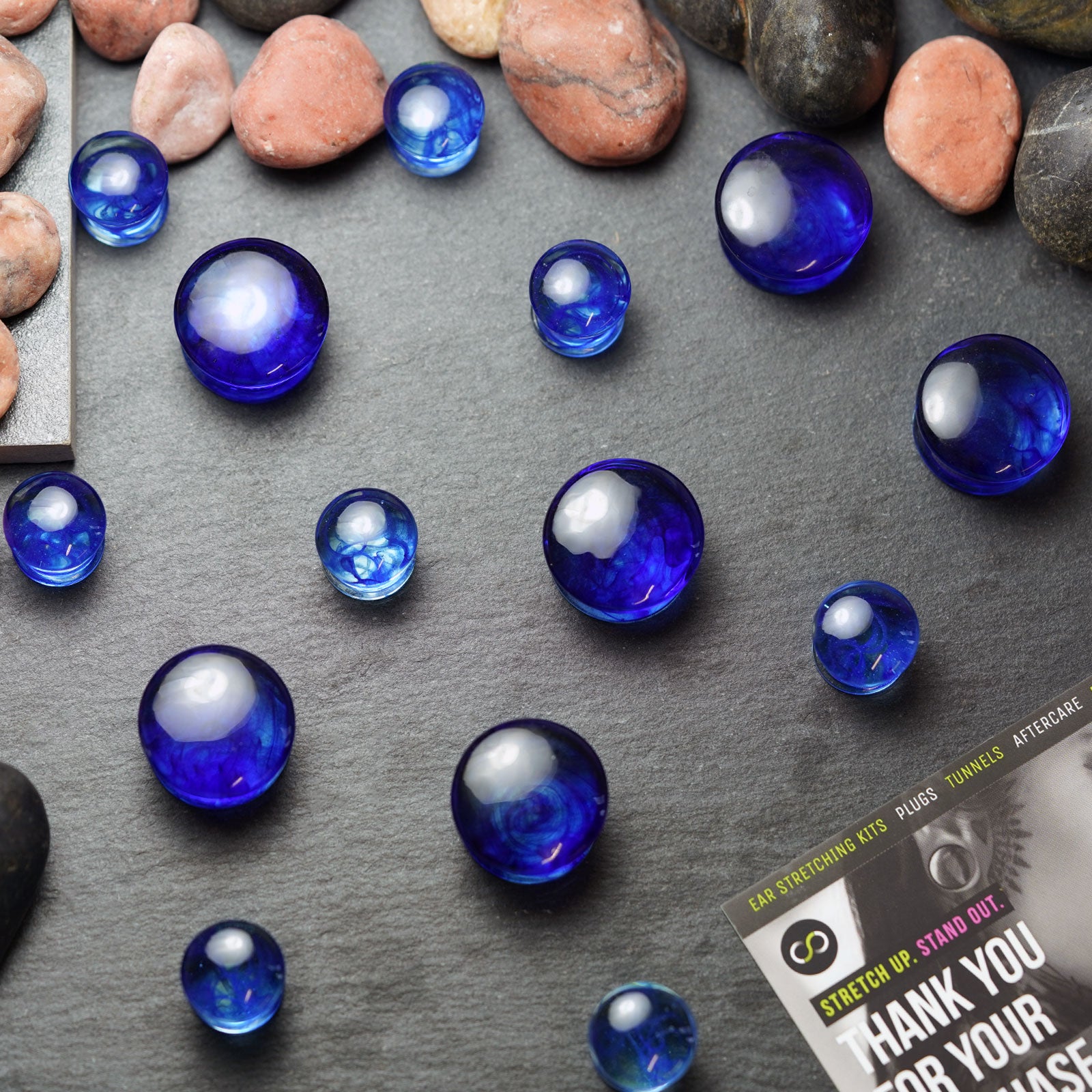 Blue Swirling Smoke Glass Double Flare Convex Plug Group Shot