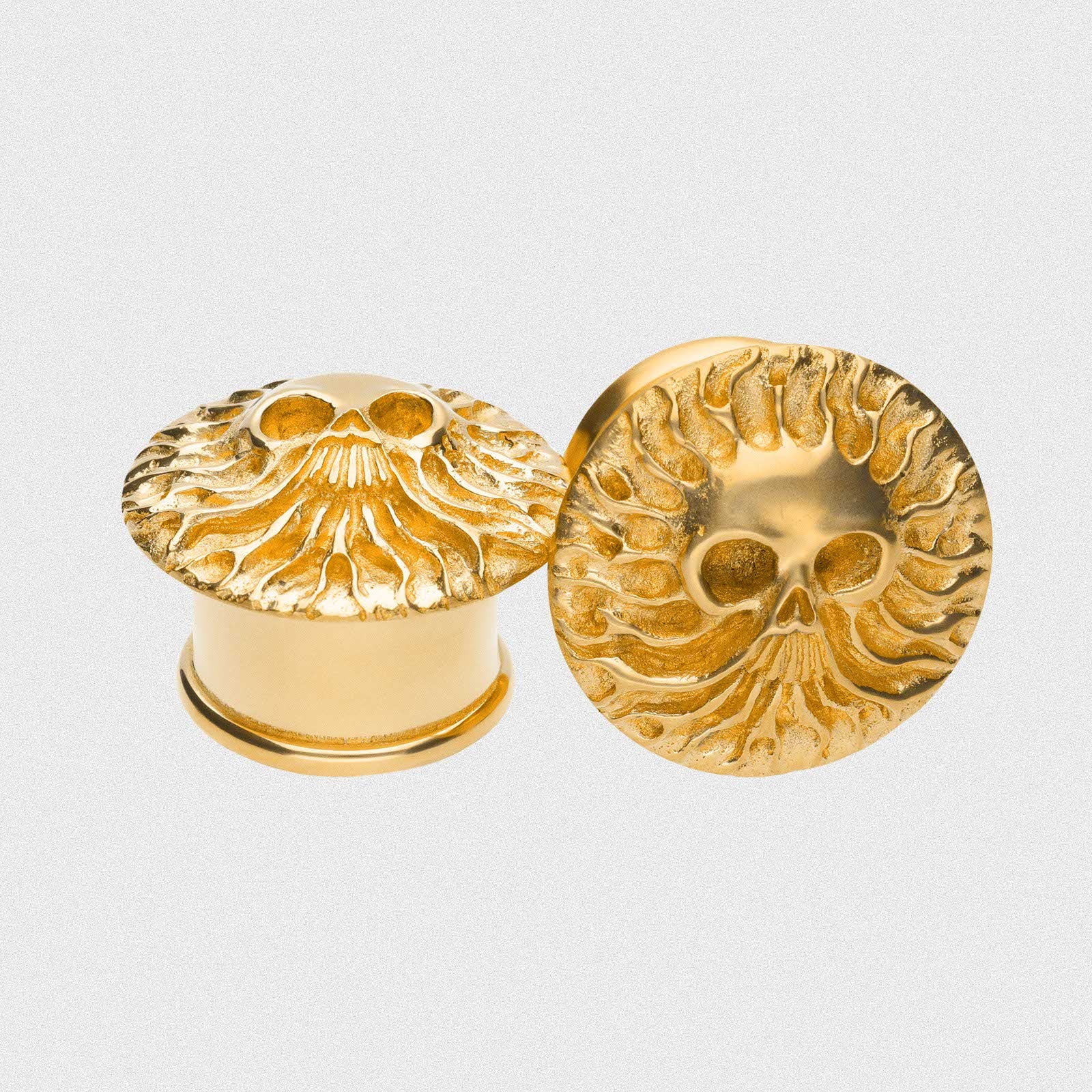 Emerging Skull Brass Double Flare Plug