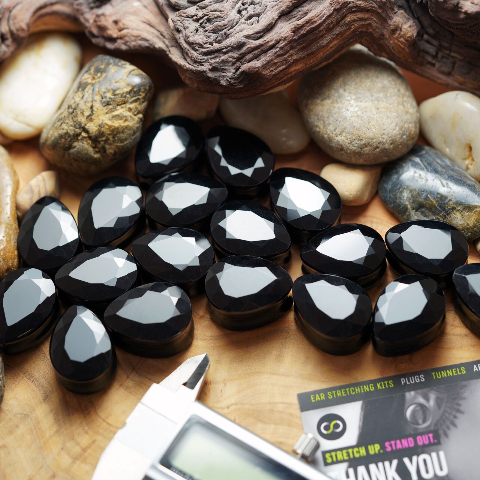Faceted Black Glass Double Flare Teardrop Plug Group Shot
