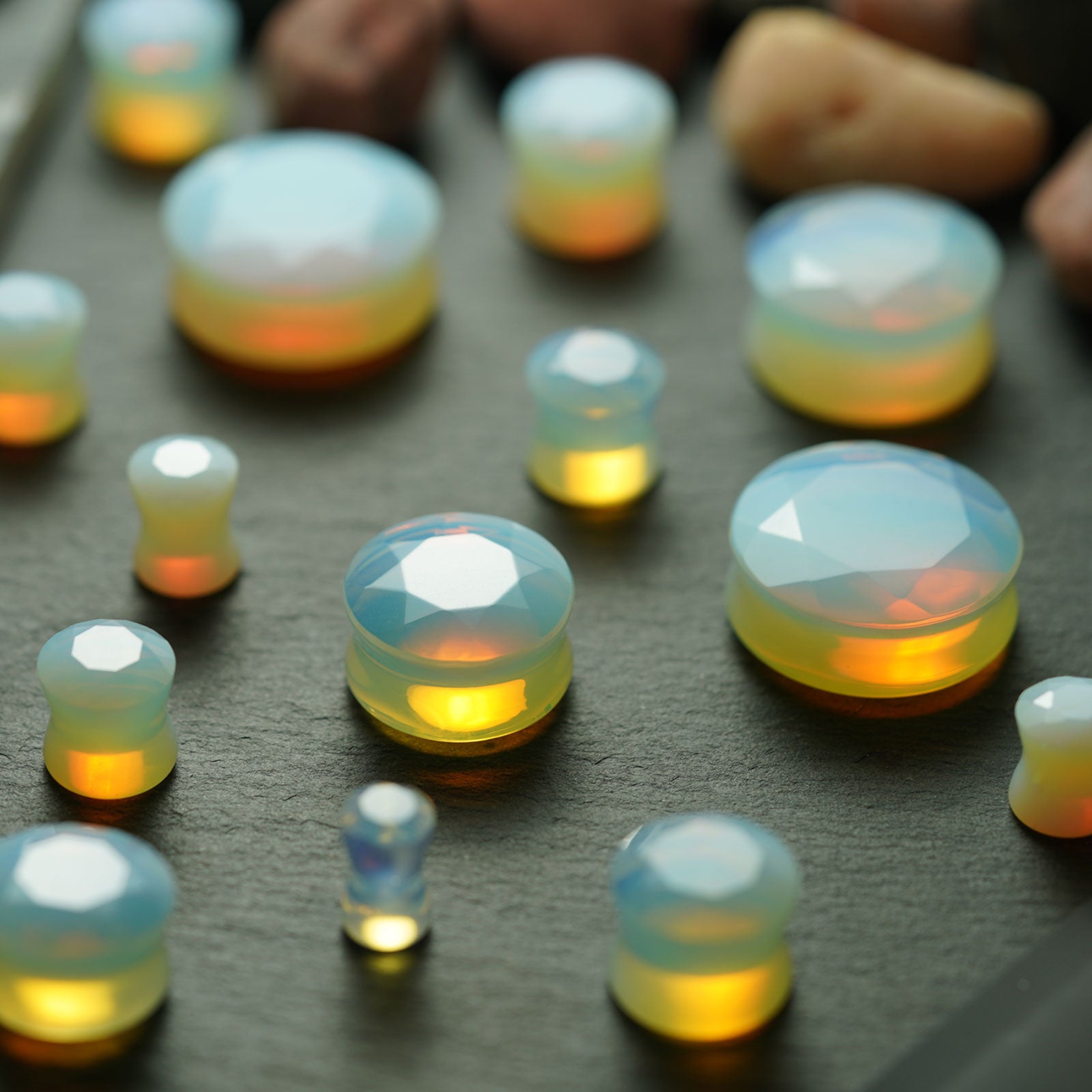 Faceted Opalite Double Flare Plug Group Shot Close Up
