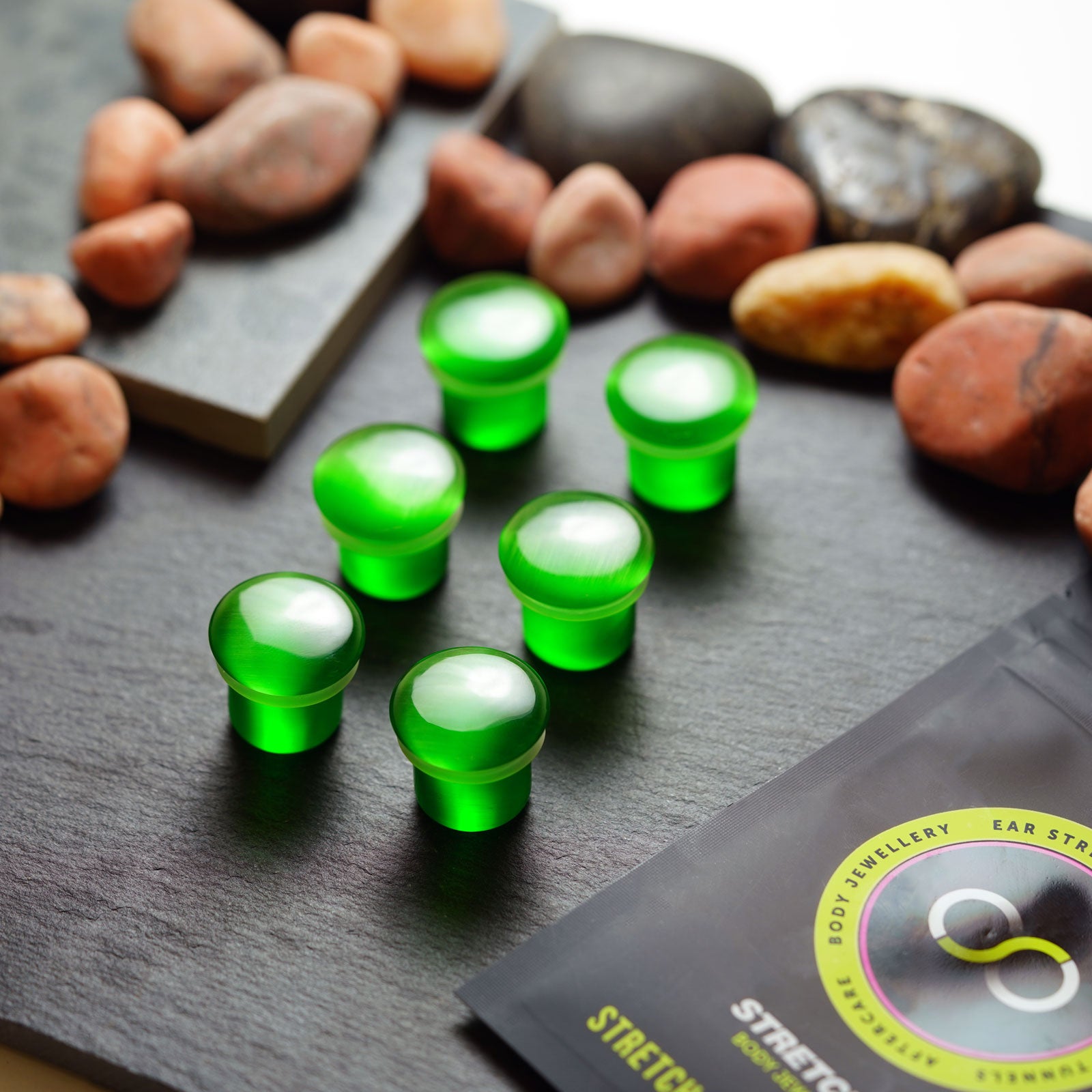 Green Cat's Eye Glass Single Flare Convex Plug Group Shot