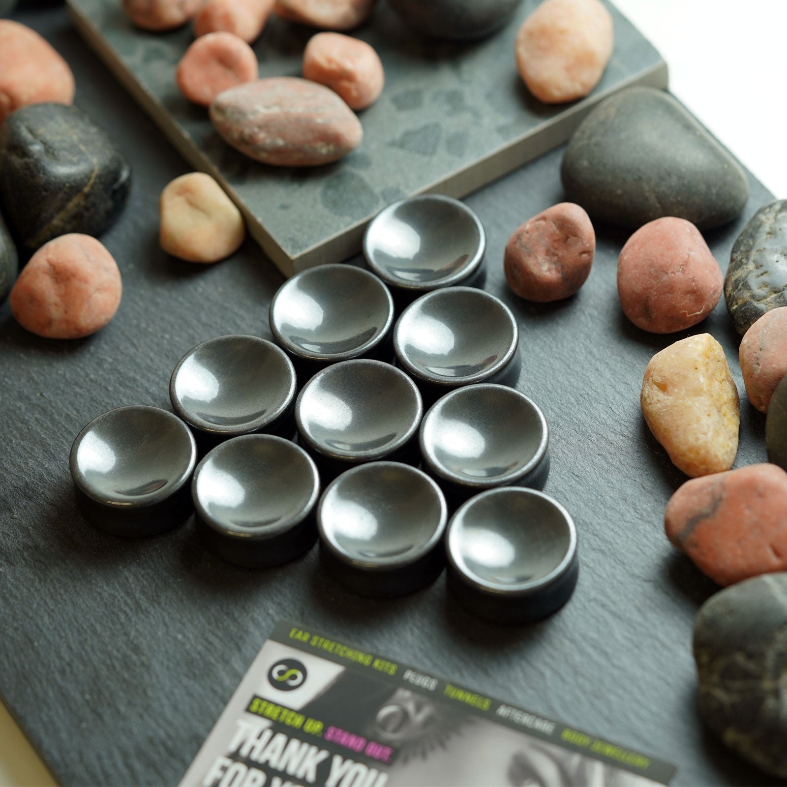 Hematine Double Flare Concave Stone Plug Group Shot
