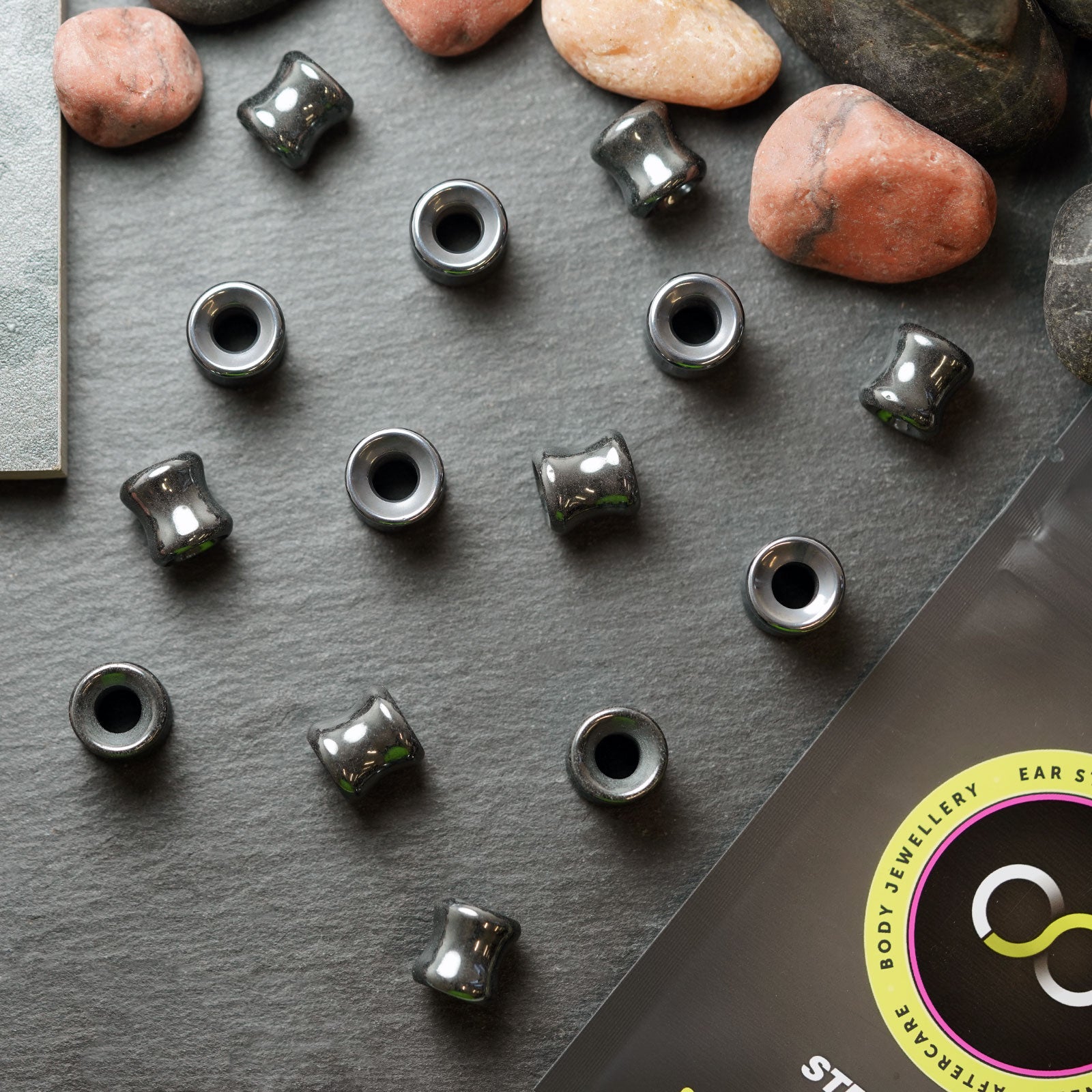 Hematine Double Flare Concave Stone Tunnel Group Shot