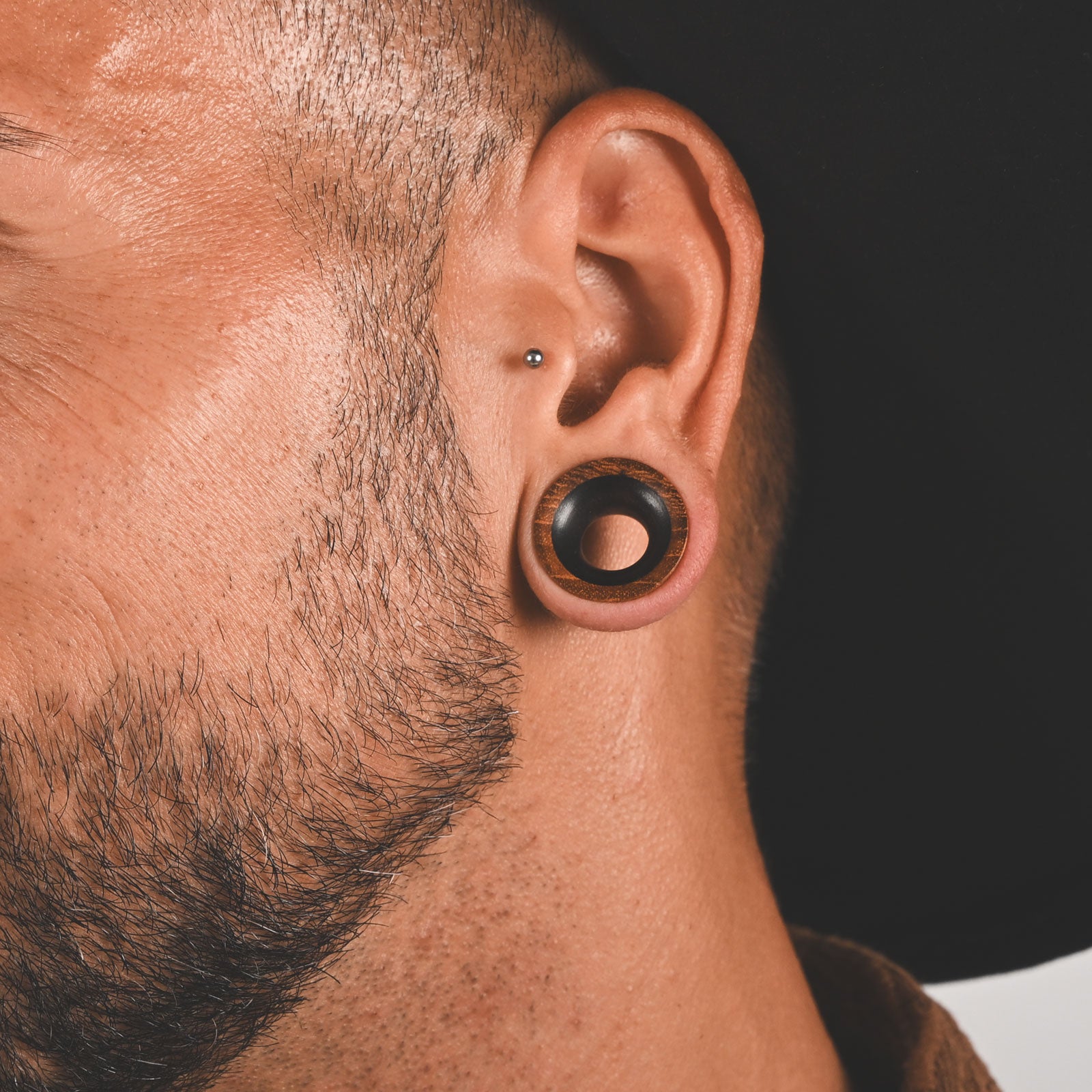 Olive Wood Double Flare Concave Tunnel With Sono Wood Inlay Model Shot Close Up