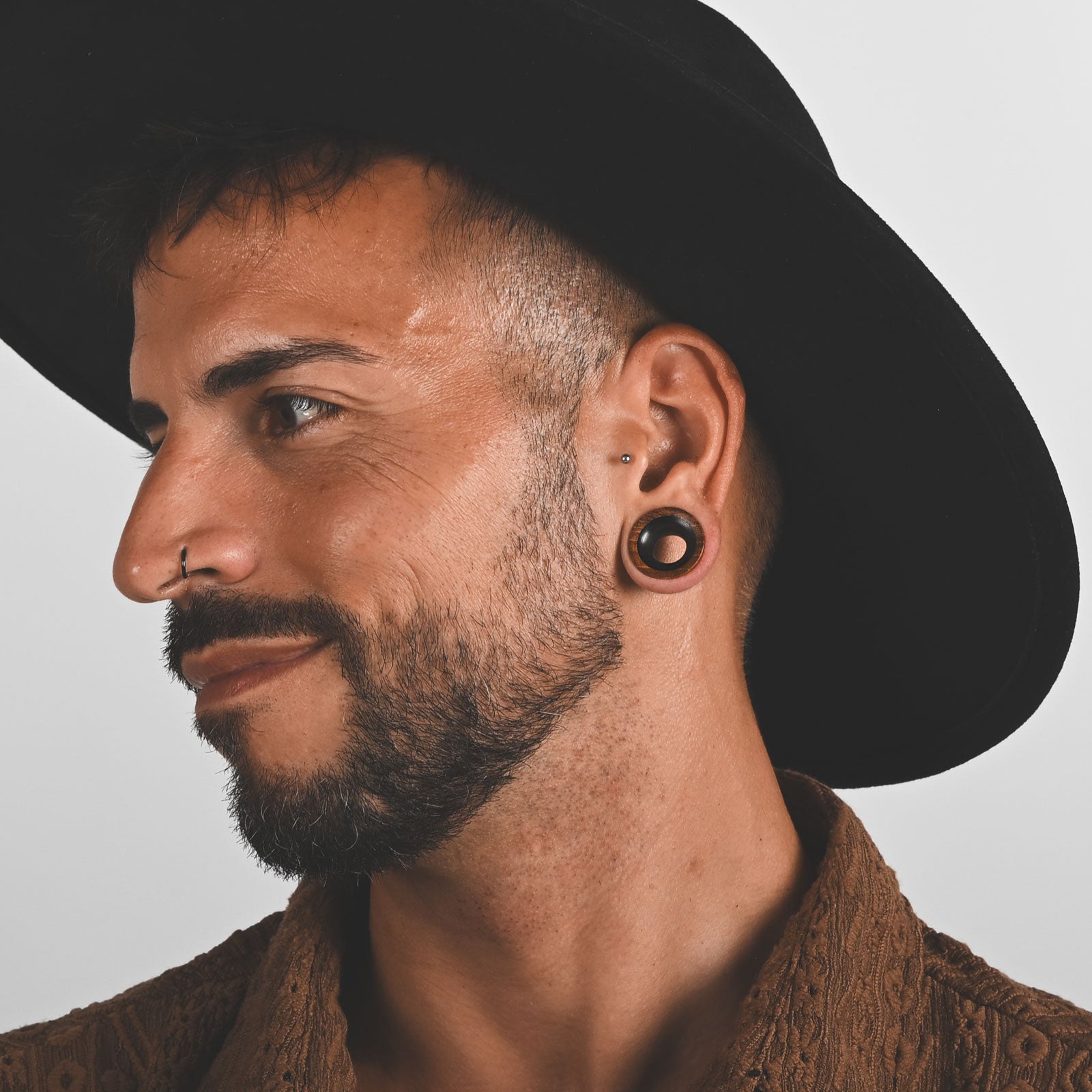 Olive Wood Double Flare Concave Tunnel With Sono Wood Inlay Model Shot Male