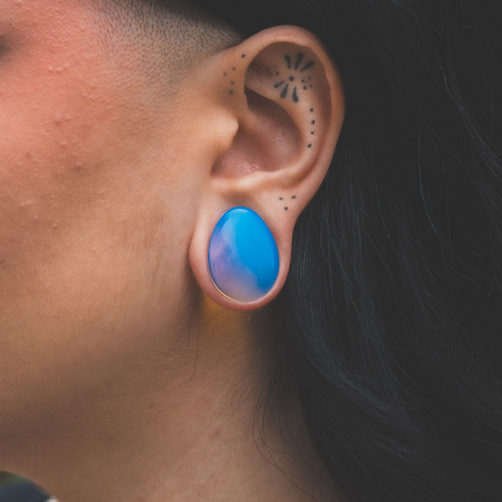 Opalite Double Flare Convex Teardrop Plug Model Shot Close Up