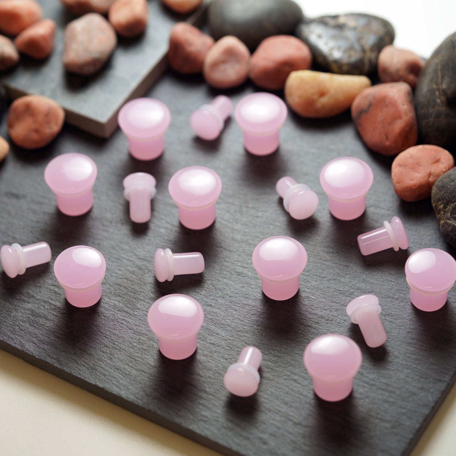 Pink Glass Single Flare Convex Plug Group Shot