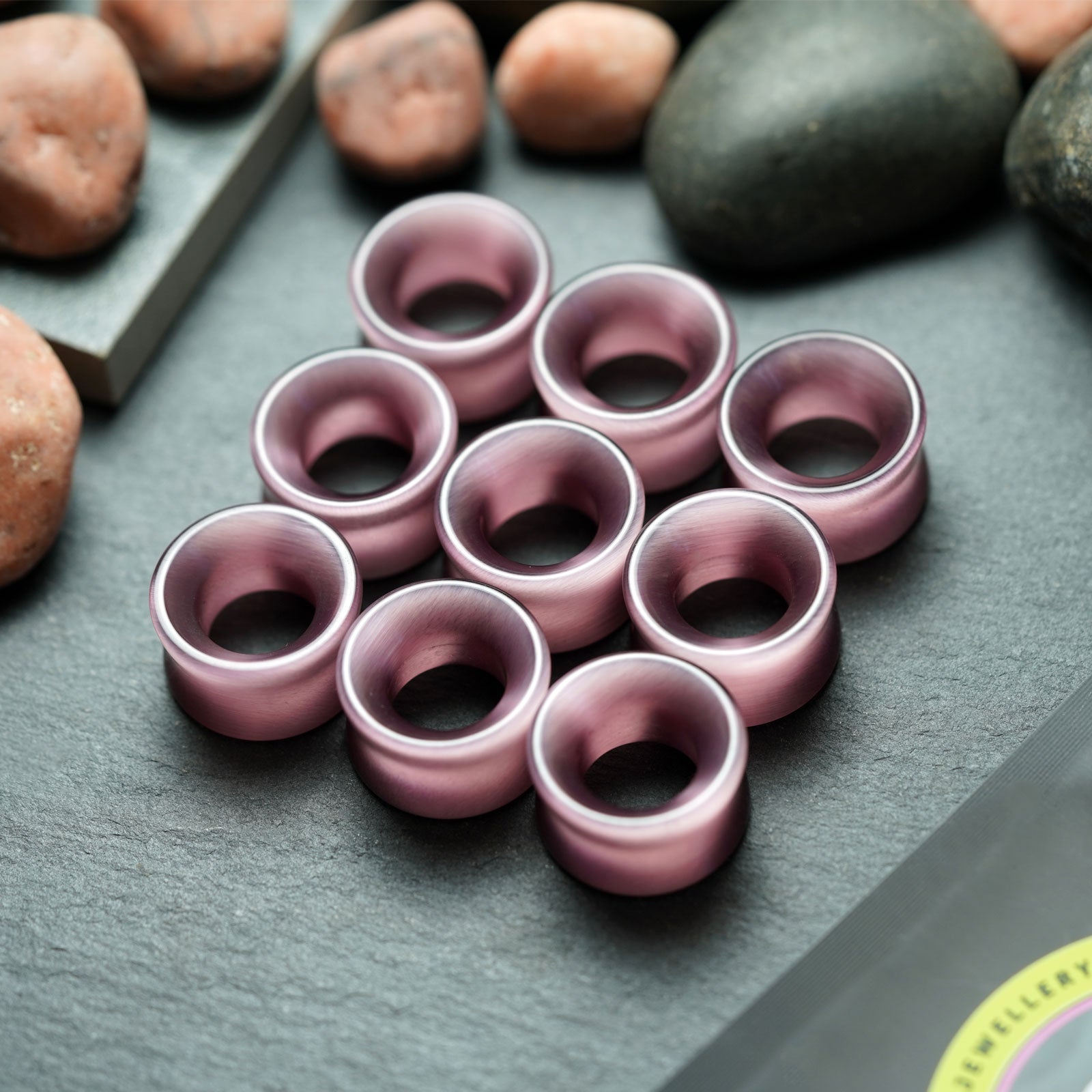 Purple Cat's Eye Glass Double Flare Concave Tunnel Group Shot