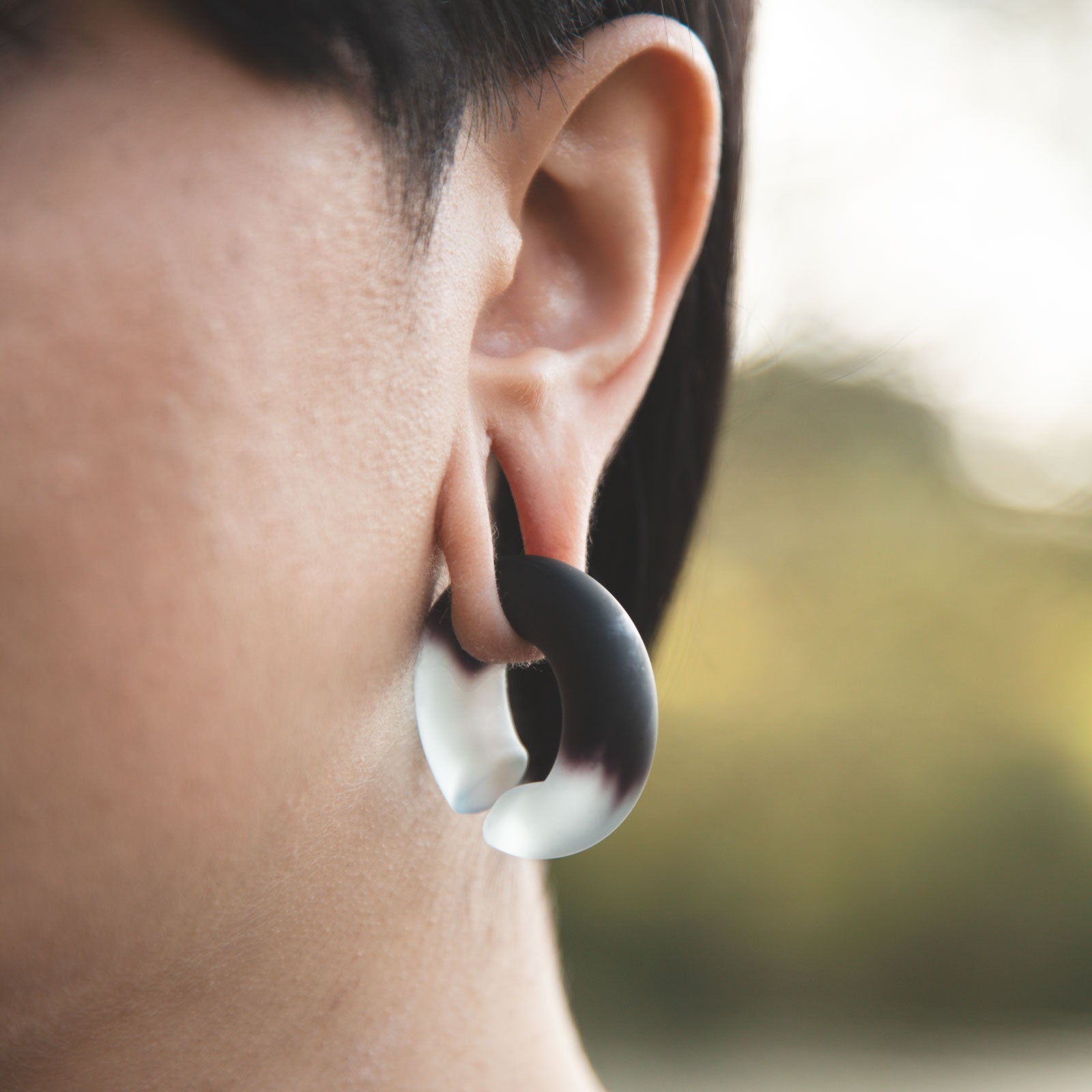 Purple & Clear Matte Glass Ear Weight Model Shot Close Up