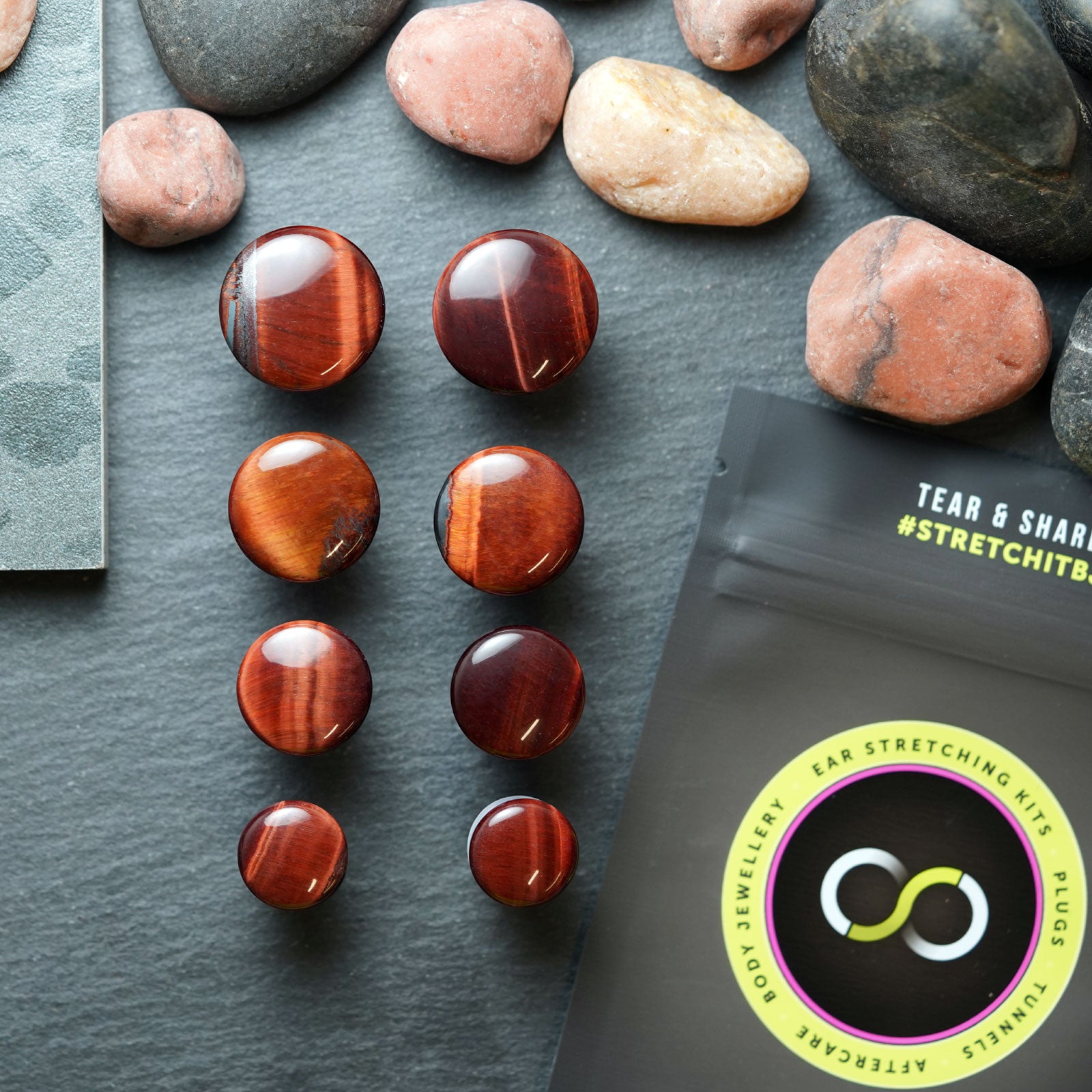 Red Tiger's Eye Single Flare Convex Stone Plug Group Shot